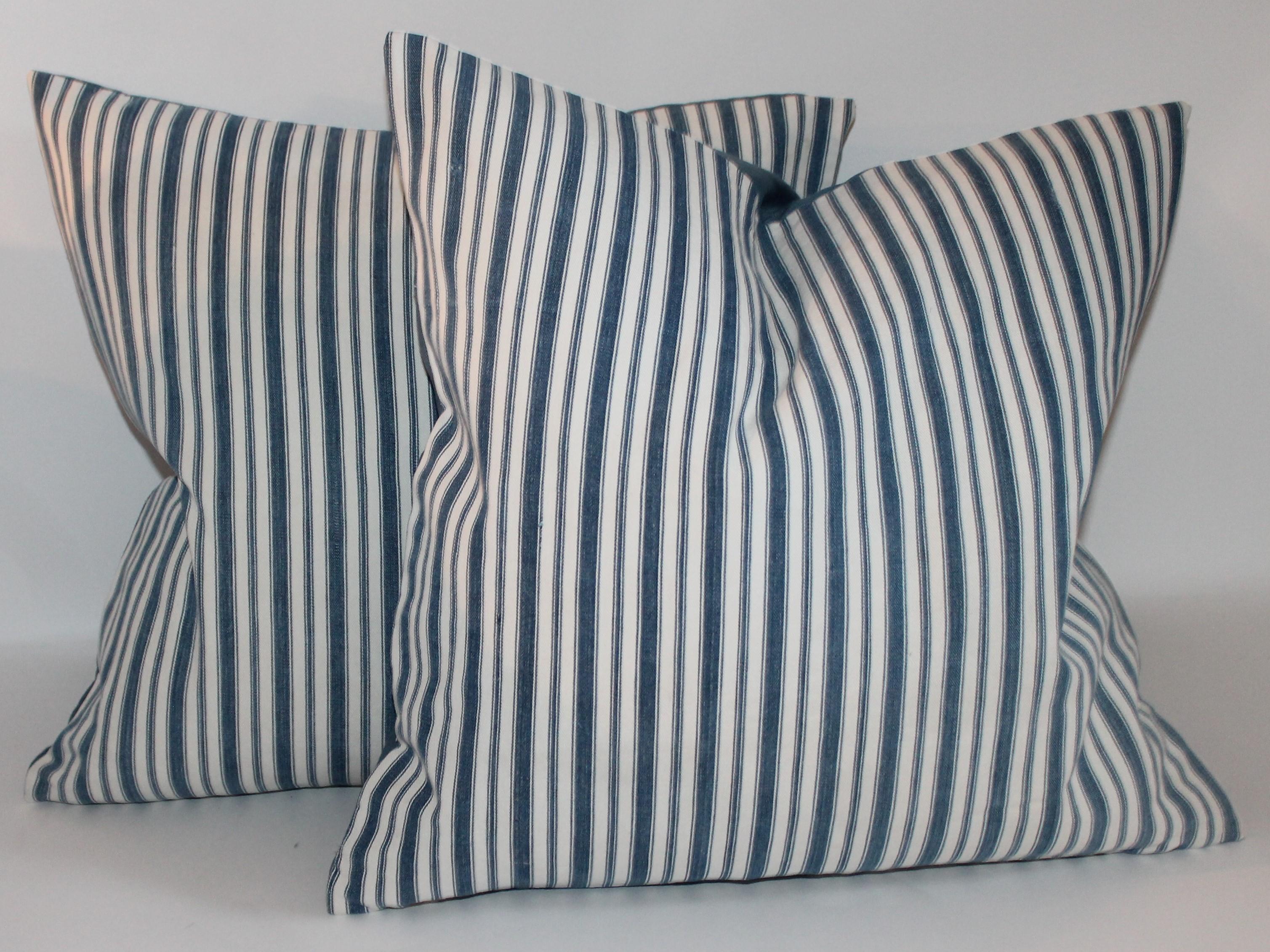 Hand-Crafted Pillow Collection of 19th Century Blue and White Ticking Pillows For Sale