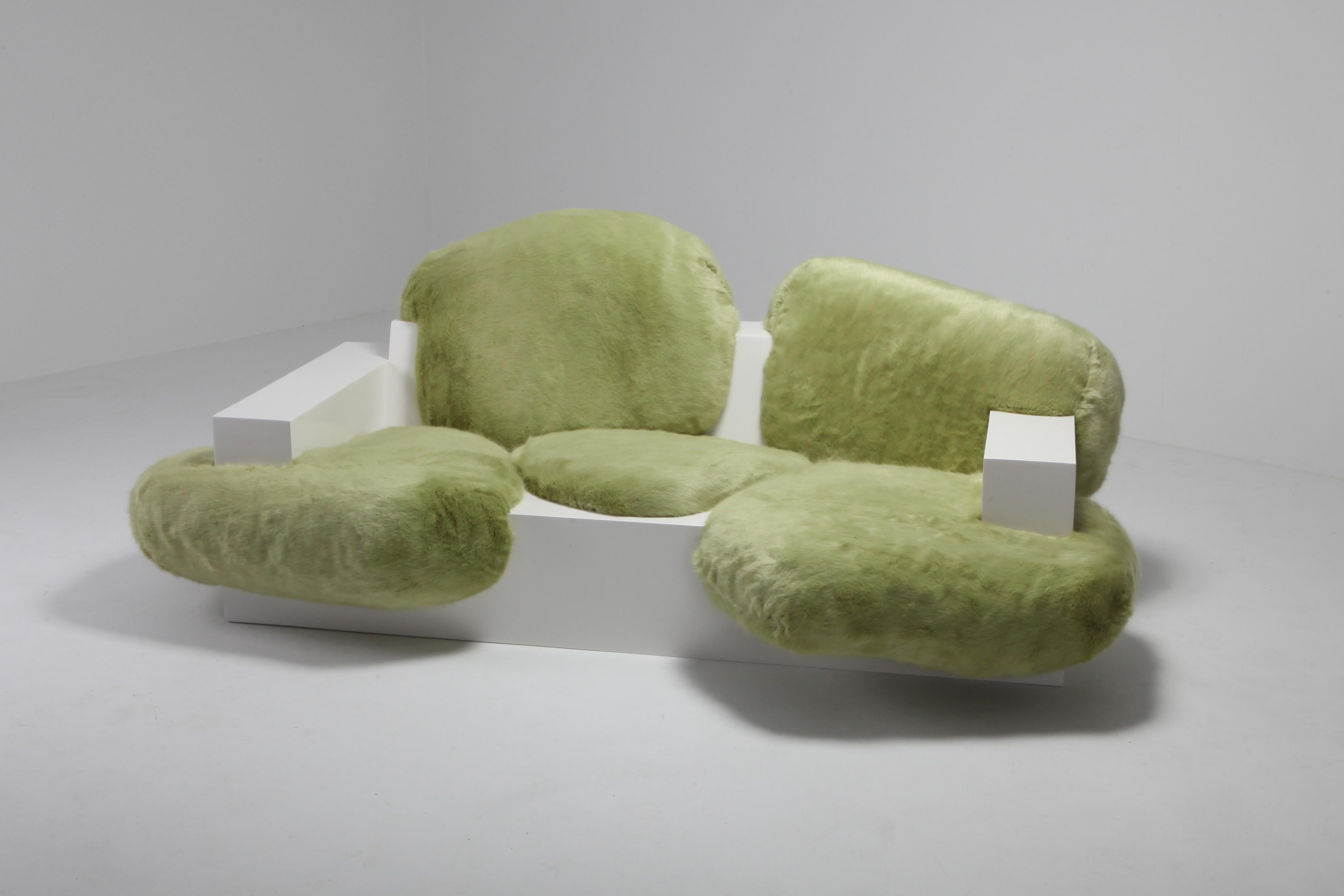Pillow couch (prototype) in white lacquer and green faux fur
Sizes: width 242 cm, depth 135 cm, height 87 cm material: wood, PU-foam, faux fur, car paint edition: prototype
developed at alfa.brussels.

Schimmel & Schweikle is an ongoing