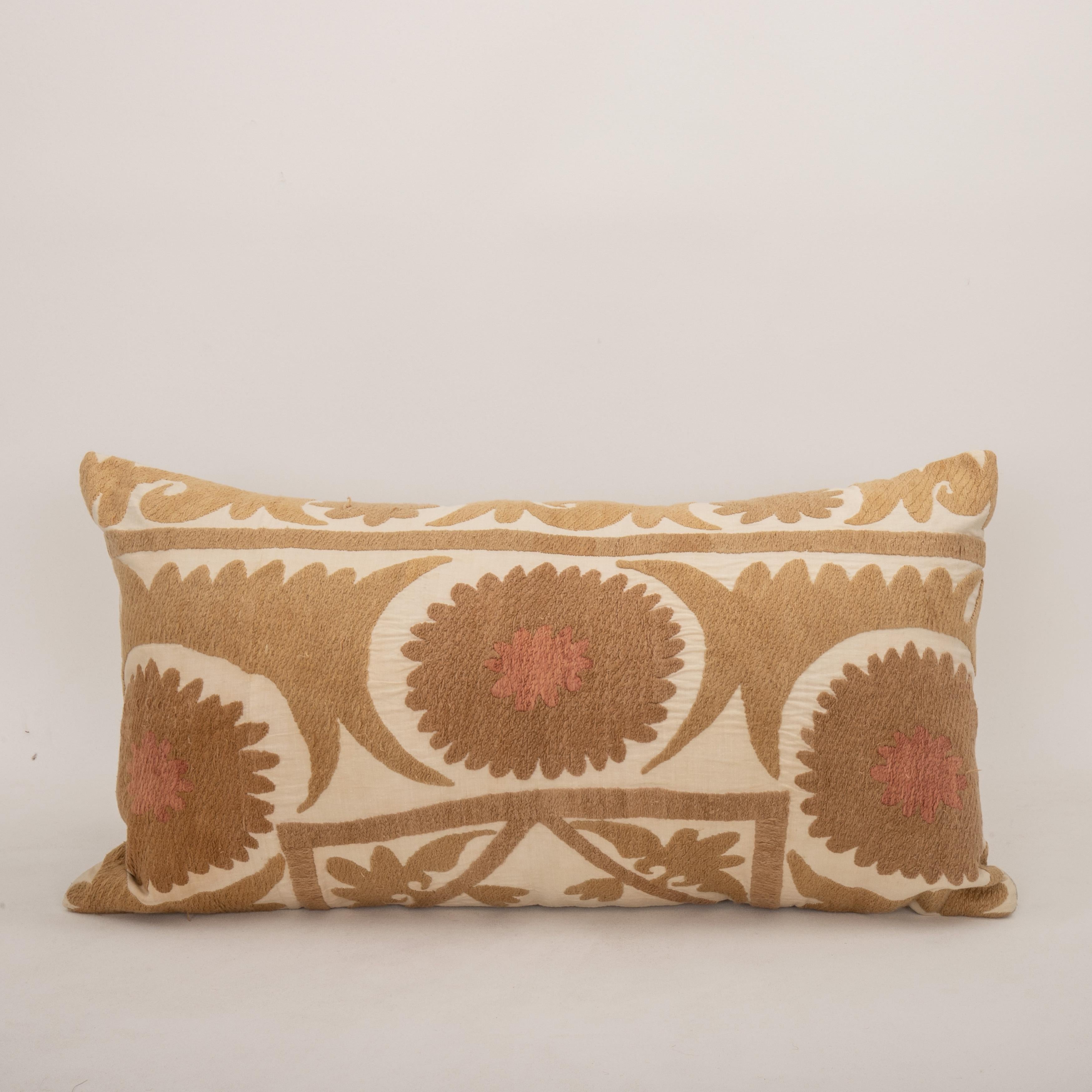 Pillow Cover Made from a Mid 20th C. Suzani, Uzbekistan
It does not come with an Insert.
Cotton in the back.
Zipper closure.
Dry clean is recommended.
