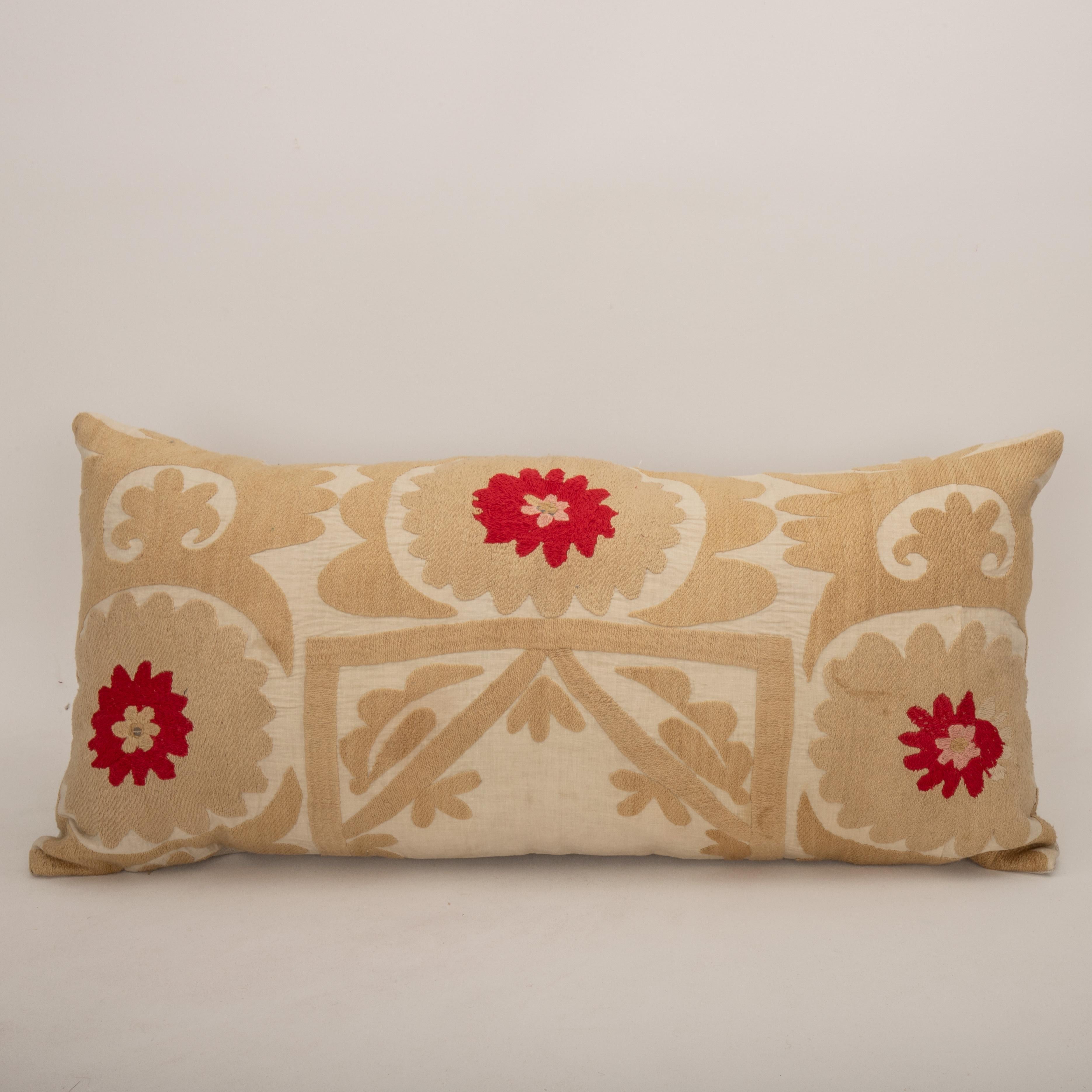 Pillow Cover Made from a Mid 20th C. Suzani, Uzbekistan
It does not come with an Insert.
Cotton in the back.
Zipper closure.
Dry clean is recommended.

