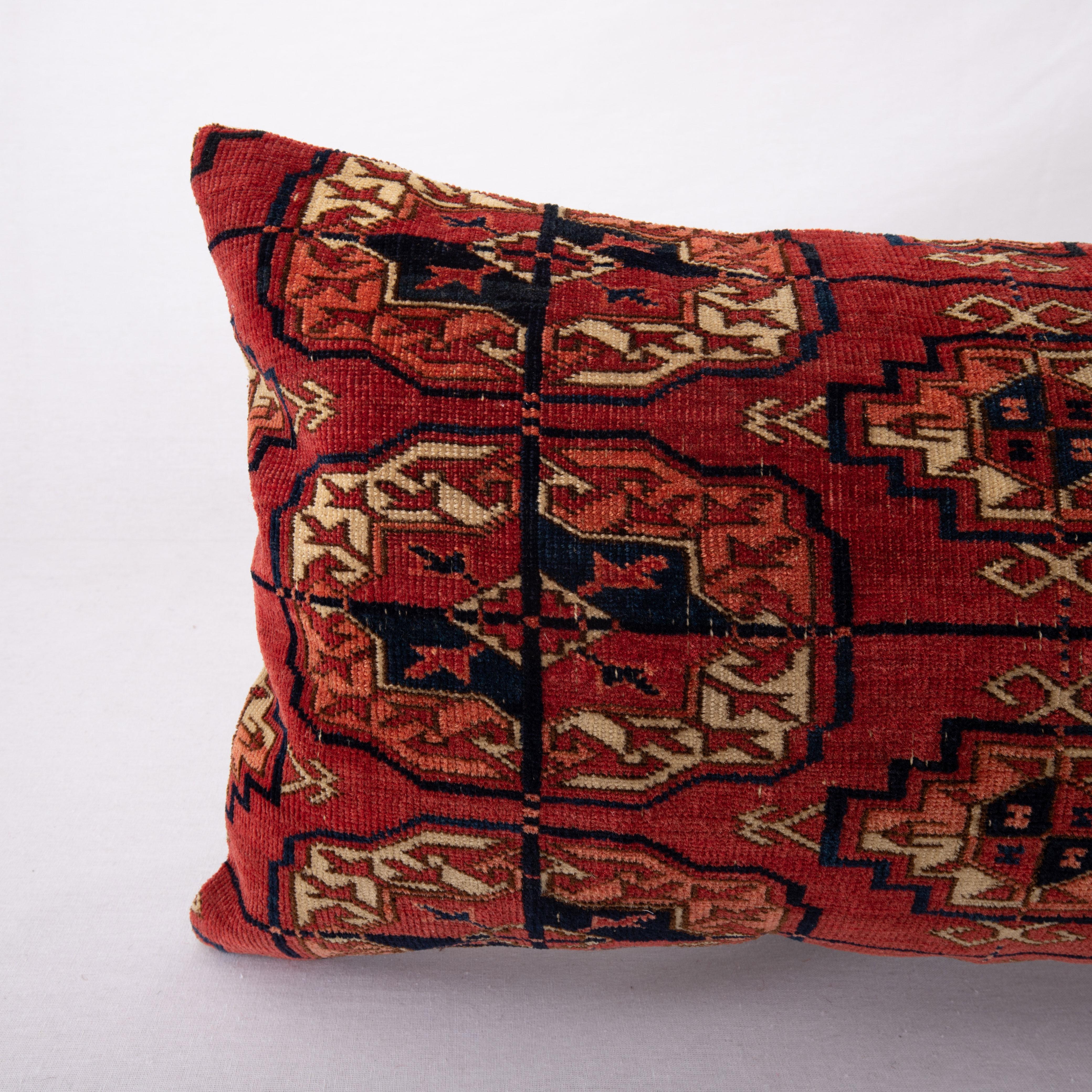 Tribal Pillow Cover Made from an Antique Central Asian Turkmen Tekke Rug Fragment For Sale