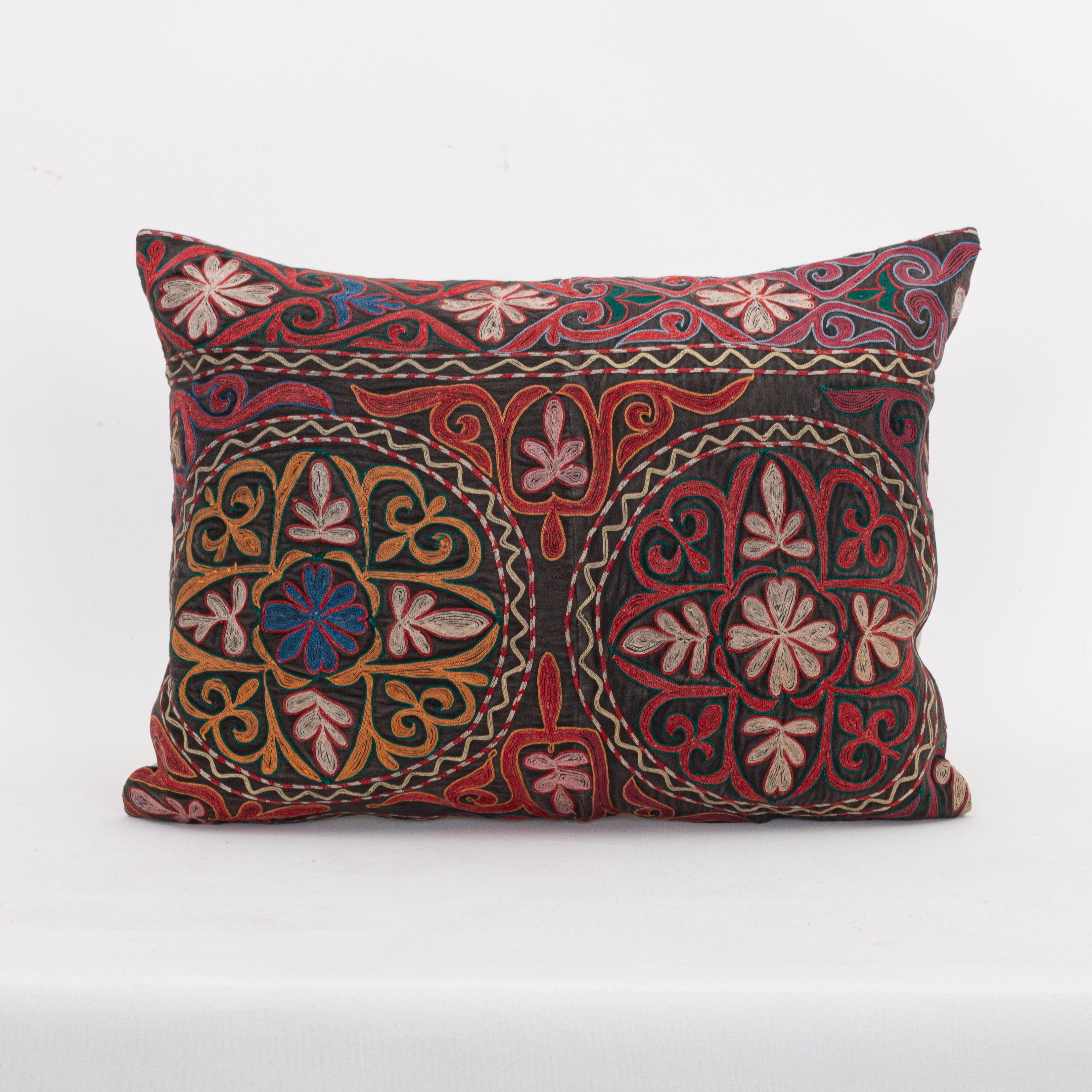 Pillowcase Made from a Vintage Kazakh Tush Kyiz Embroidery

It does not come with an insert,
Linen in the back.
Zipper Closure
Dry Clean recommended.

