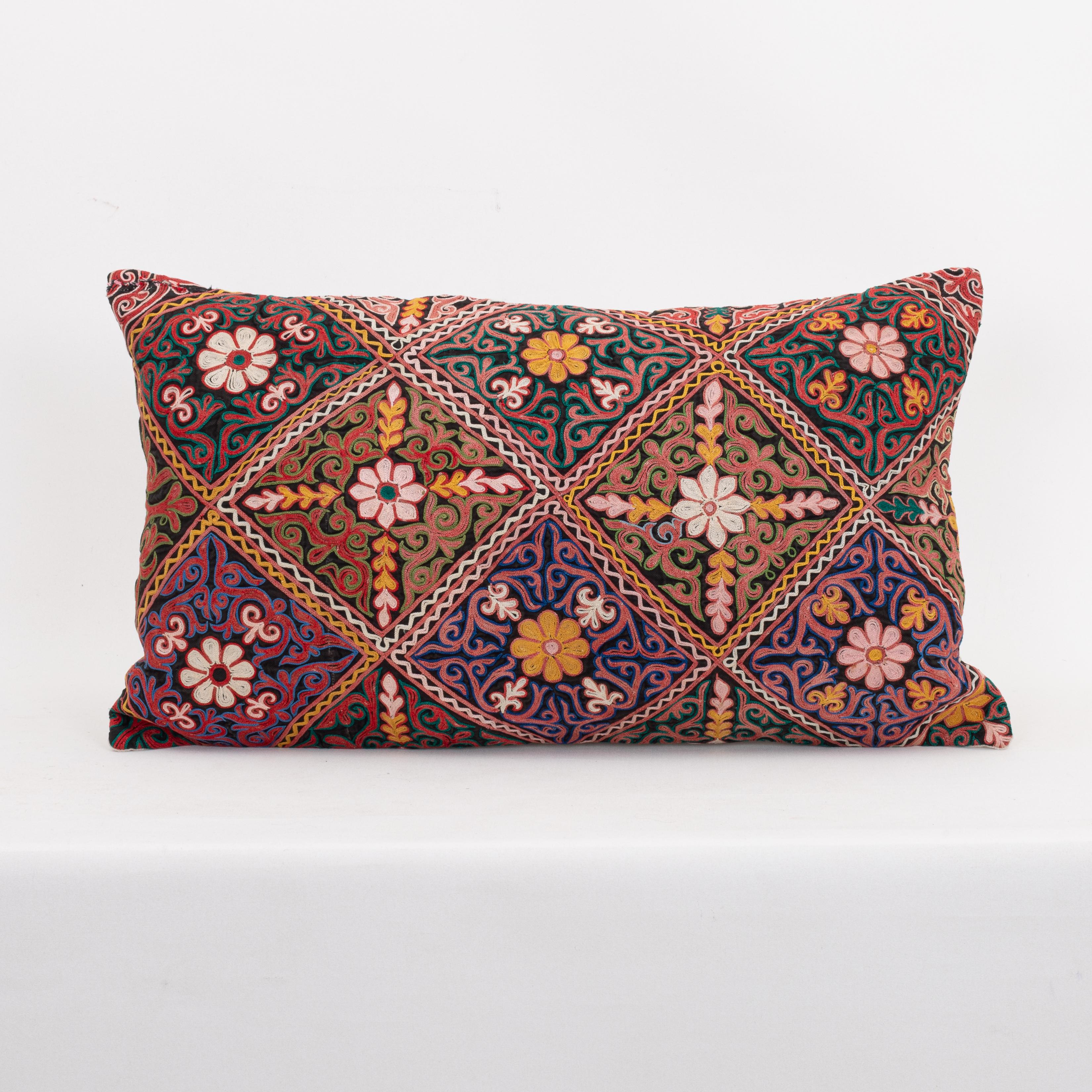 Pillowcase Made from a Vintage Kazakh Tush Kyiz Embroidery

It does not come with an insert,
Linen in the back.
Zipper Closure
Dry Clean recommended.
