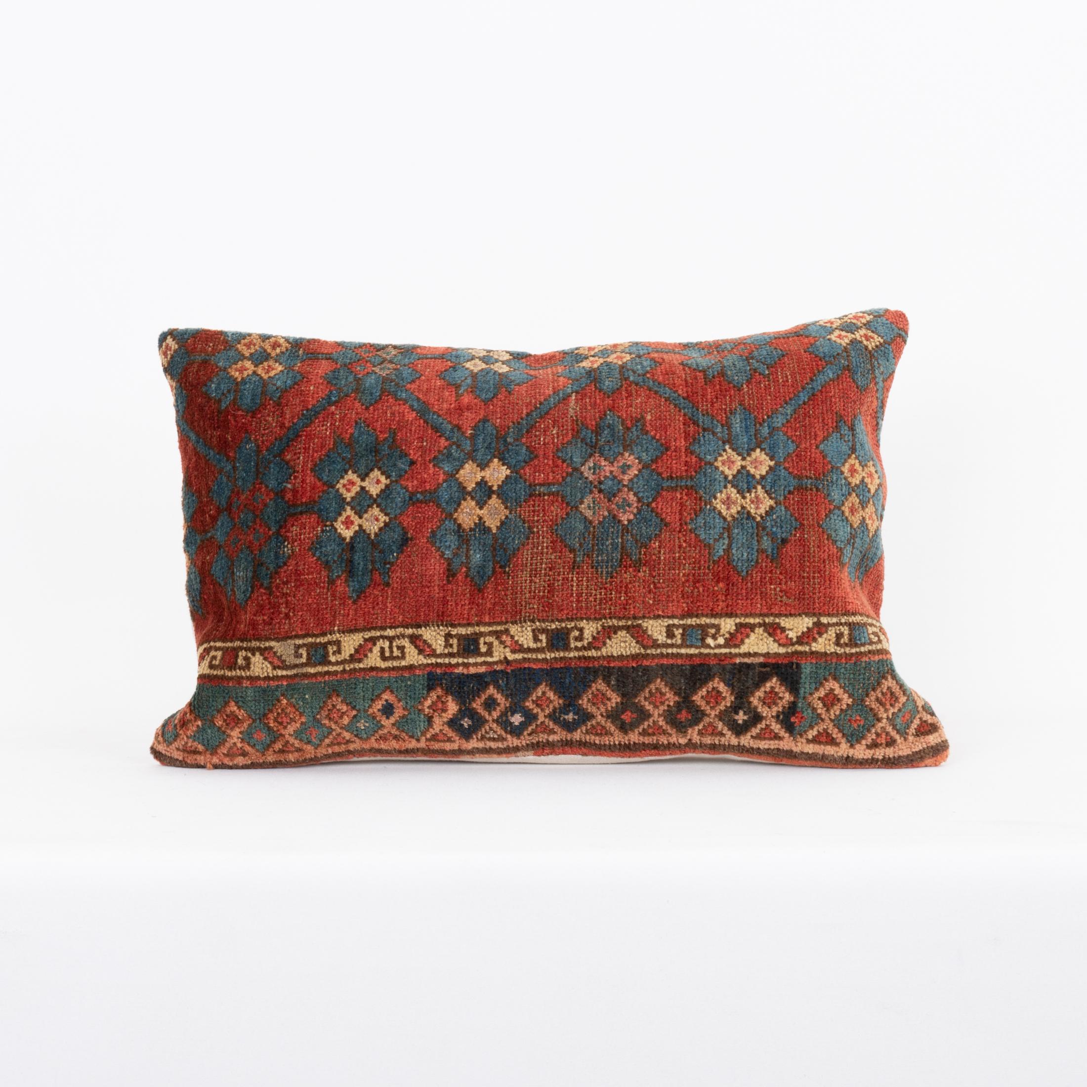 Pillowcase Made from an Antique Kyrgyz Rug, Kyrgyzstan, Central Asia

It does not come with an insert.
Linen in the back.
Zipper closure.
Dry cleaning recomended.
