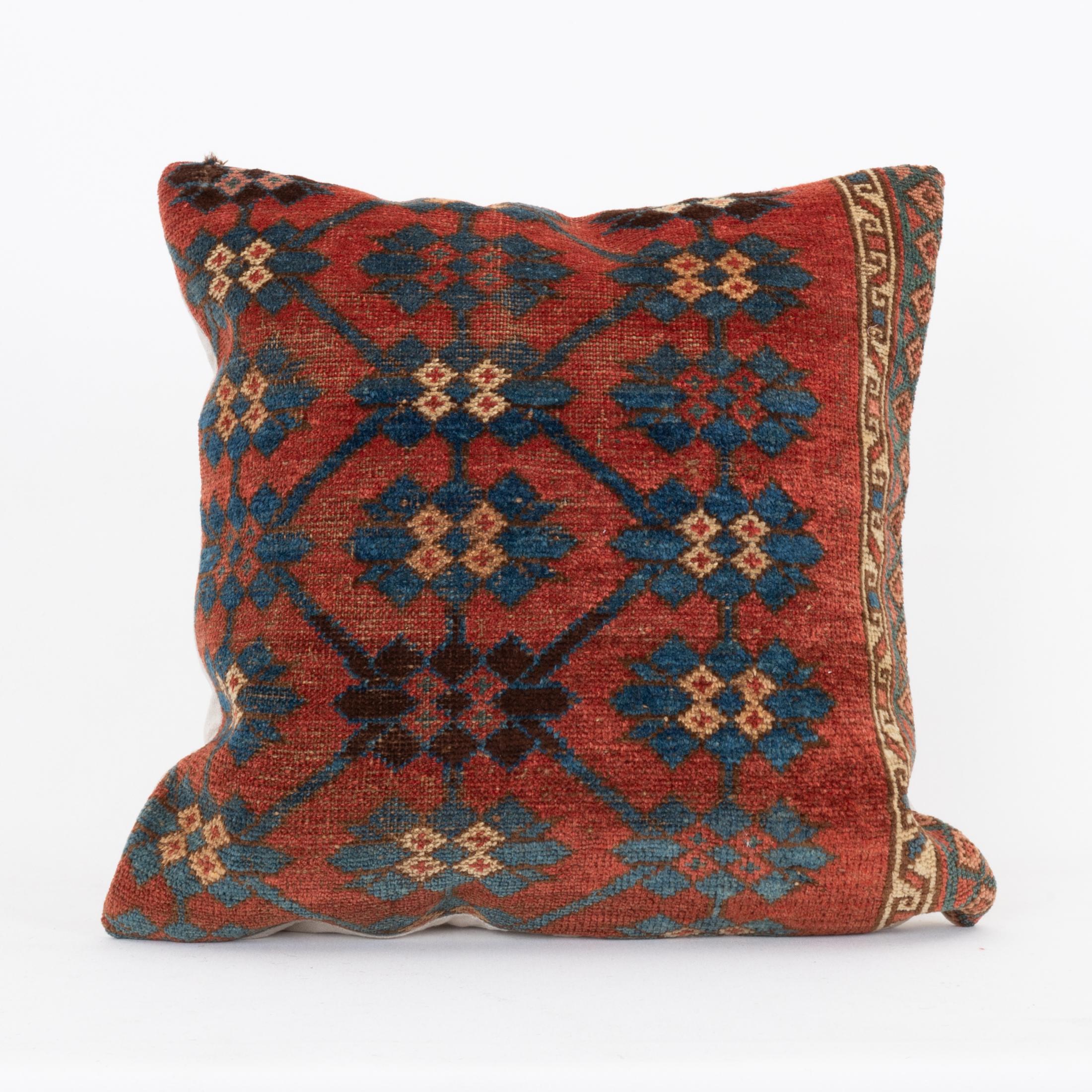 Pillowcase Made from an Antique Kyrgyz Rug, Kyrgyzstan, Central Asia

It does not come with an insert.
Linen in the back.
Zipper closure.
Dry cleaning reccommended.
