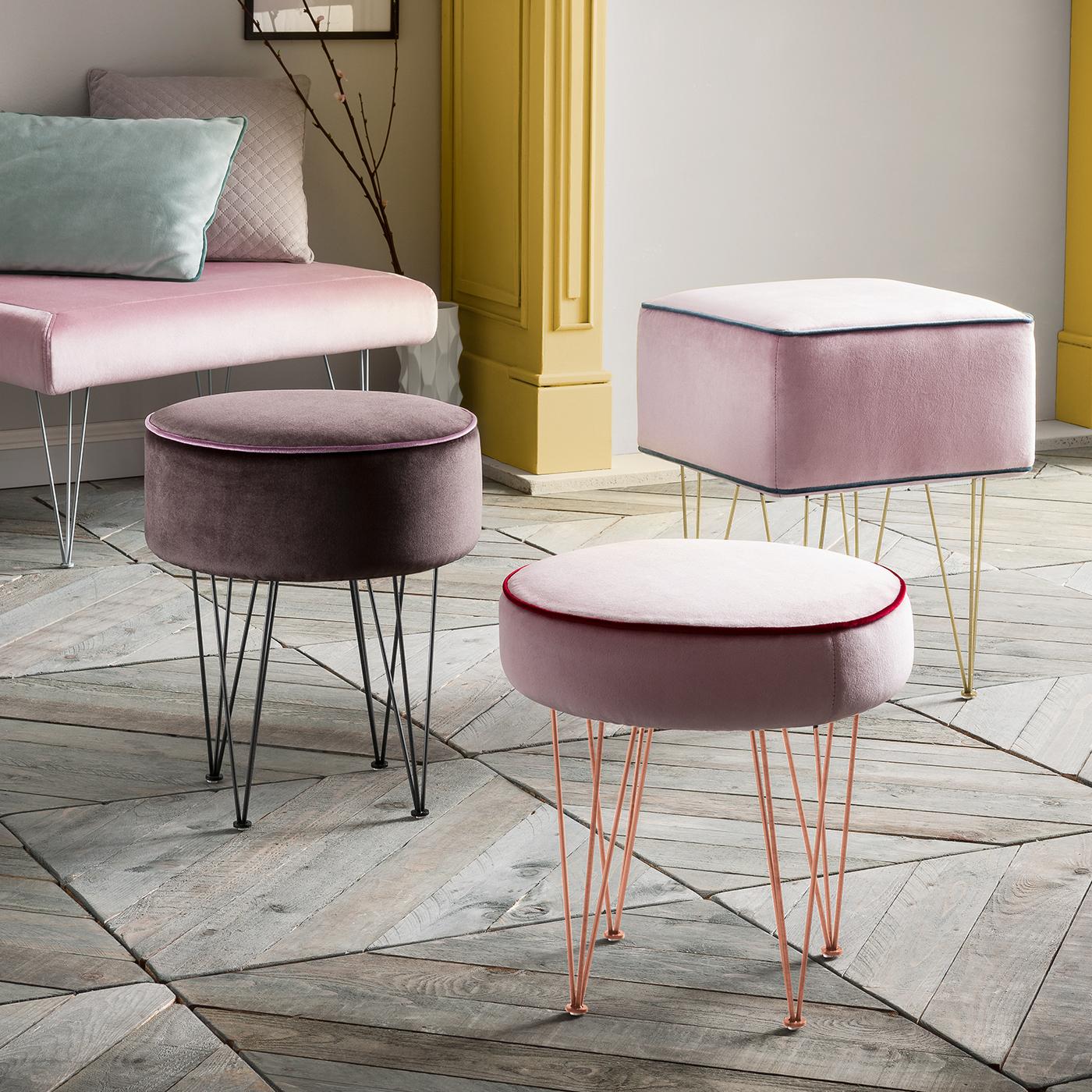 This expertly crafted pouf is made with eco-friendly and sustainable materials and features four metal hairpin legs with a copper galvanic finish that provide support while appearing light and airy. The polyurethane-padded square top of fir, pine,