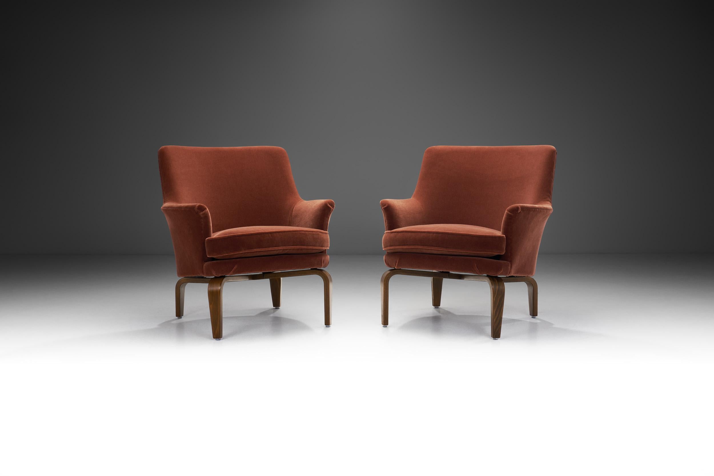 Swedish designer, Arne Norell’s conceptual designs, gained recognition for their use of traditional materials and forms like fabrics and wood combined with simple and vanguard lines. This pair of “Pilot” chairs was designed by Arne Norell in 1967