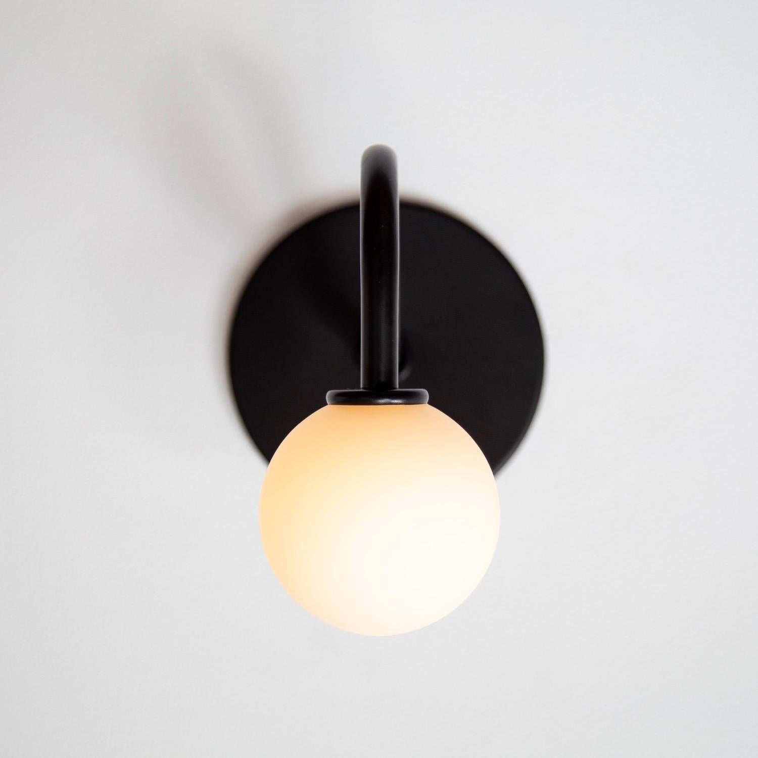 This listing is for 1x Pin Up Sconce in black manufactured by Research.Lighting. It can be used facing up or down.

Materials: Brass, Steel & Glass
Finish: Black
Electronics: 1x G9 Socket, 1x 4.5 Watt LED Bulb (included), 450 Lumens
Globe Size: