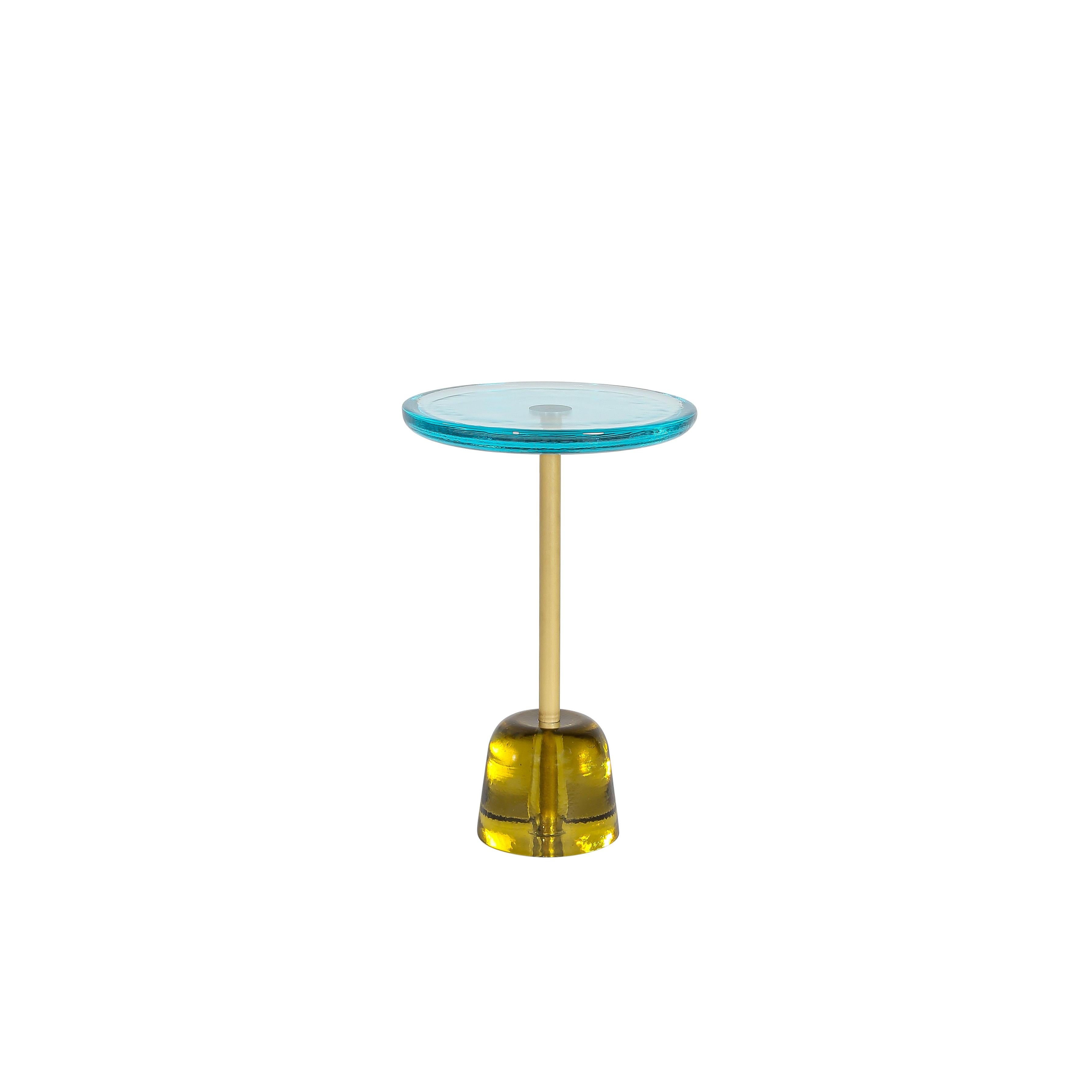 Pina high aqua blue brass side table by Pulpo
Dimensions: D34 x H52 cm
Materials: glass; brass and steel

Also available in different colours. 

Sebastian Herkner’s distinctively tall, skinny side table series pina is inspired by the abstract