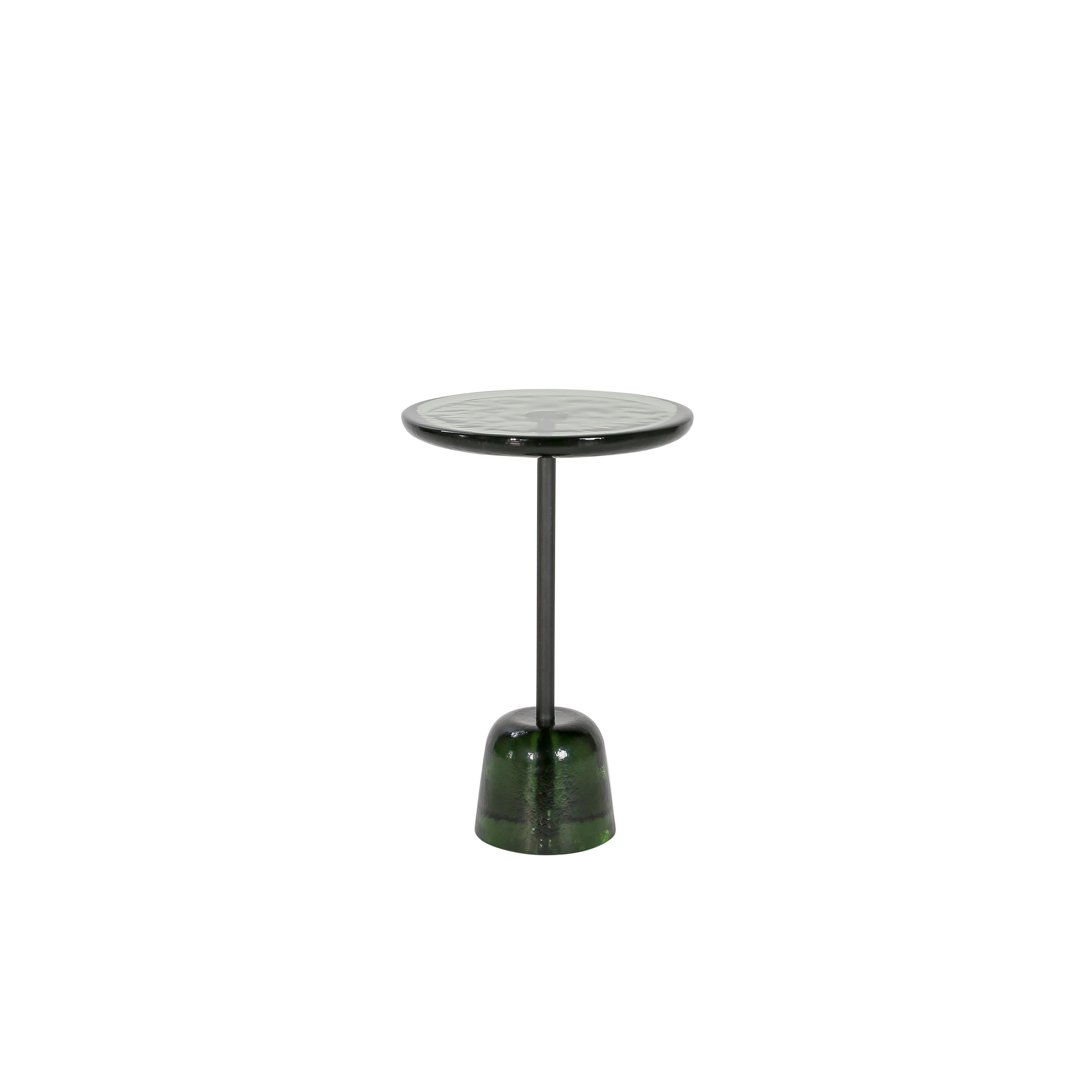 Pina high green black green side table by Pulpo
Dimensions: D34 x H52 cm.
Materials: glass; brass and steel.

Also available in different colours. 

Sebastian Herkner’s distinctively tall, skinny side table series pina is inspired by the