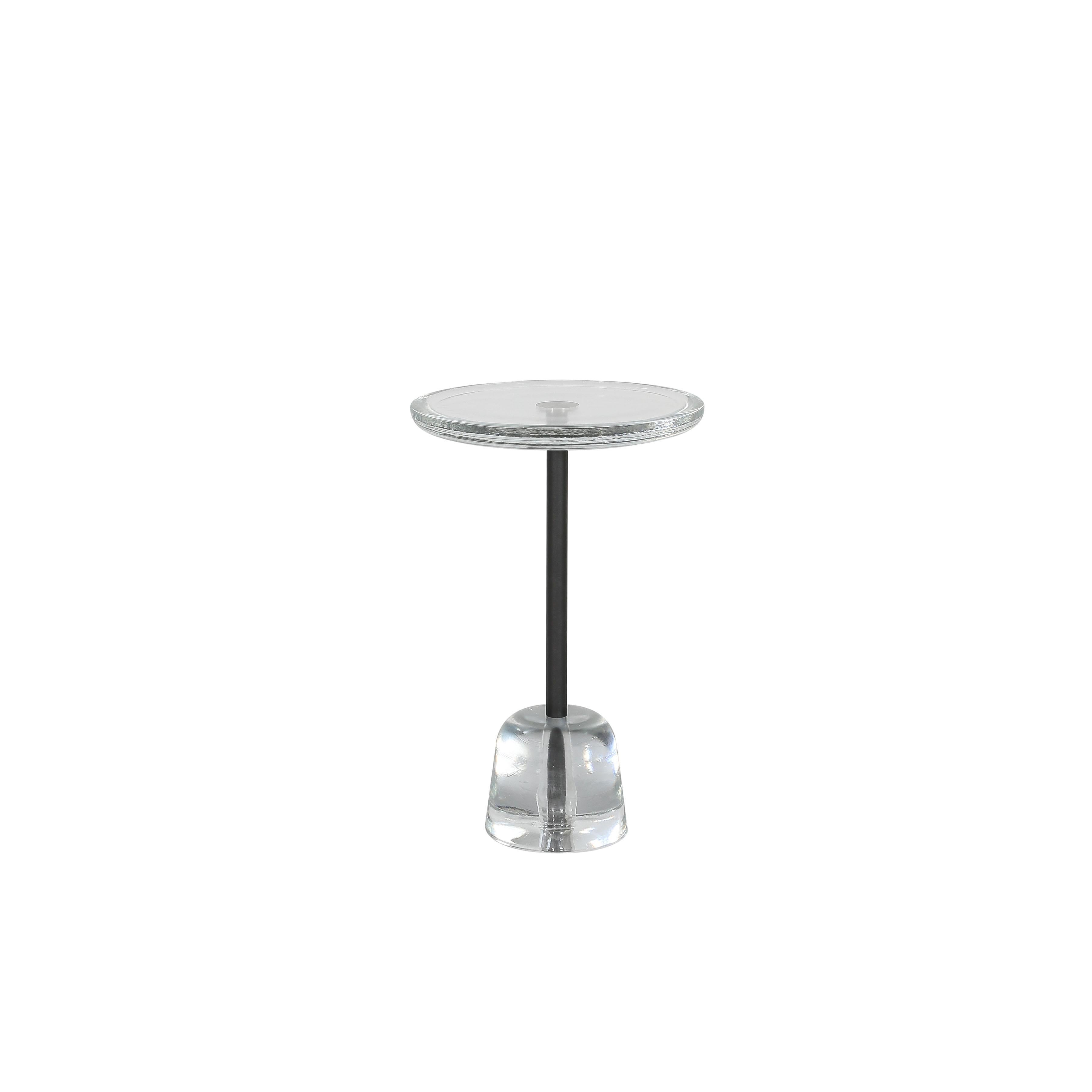 Pina high transparent black side table by Pulpo
Dimensions: D34 x H52 cm
Materials: glass; brass and steel

Also available in different colours. 

Sebastian Herkner’s distinctively tall, skinny side table series pina is inspired by the