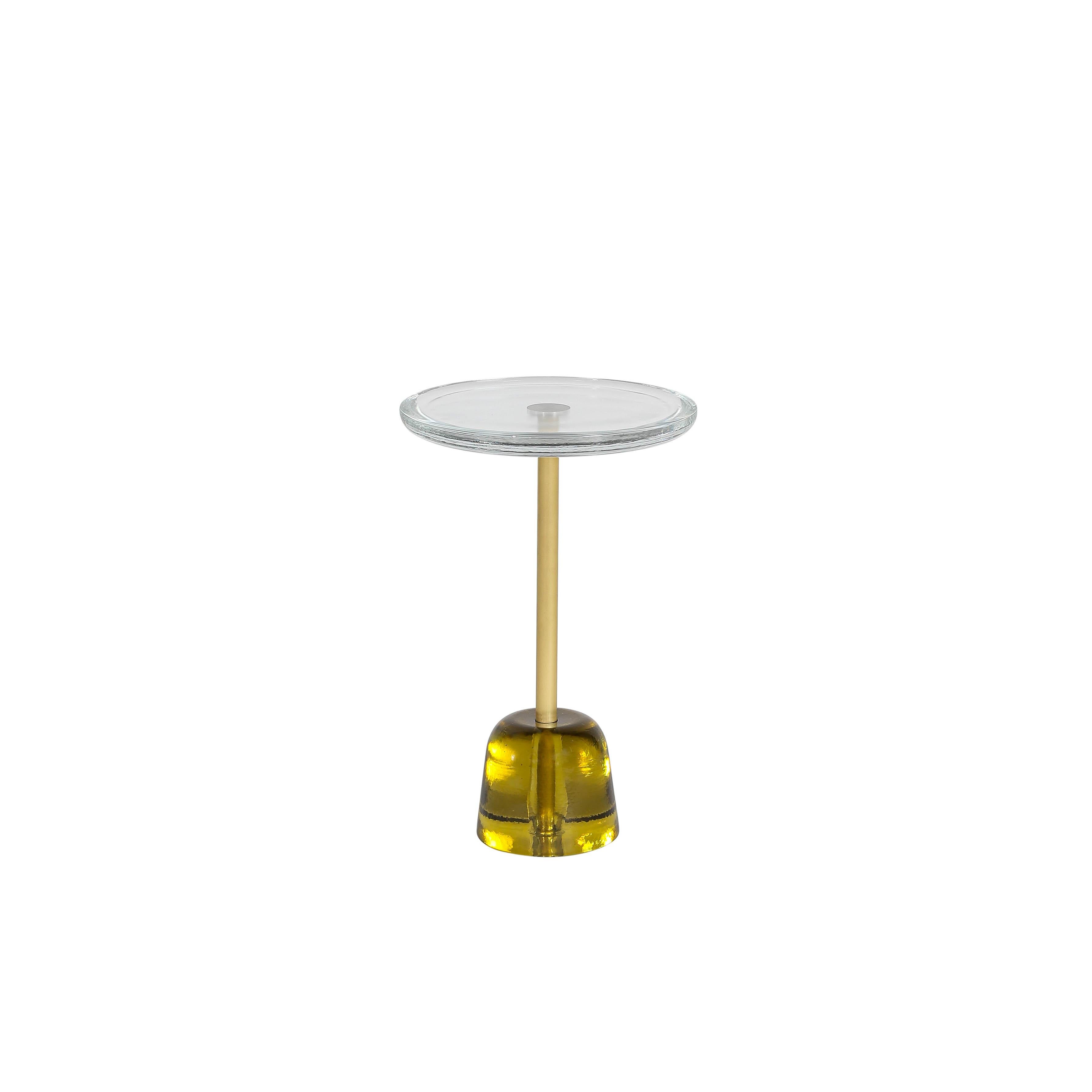 Pina high transparent brass side table by Pulpo
Dimensions: D34 x H52 cm
Materials: glass; brass and steel

Also available in different colours.

Sebastian Herkner’s distinctively tall, skinny side table series pina is inspired by the abstract
