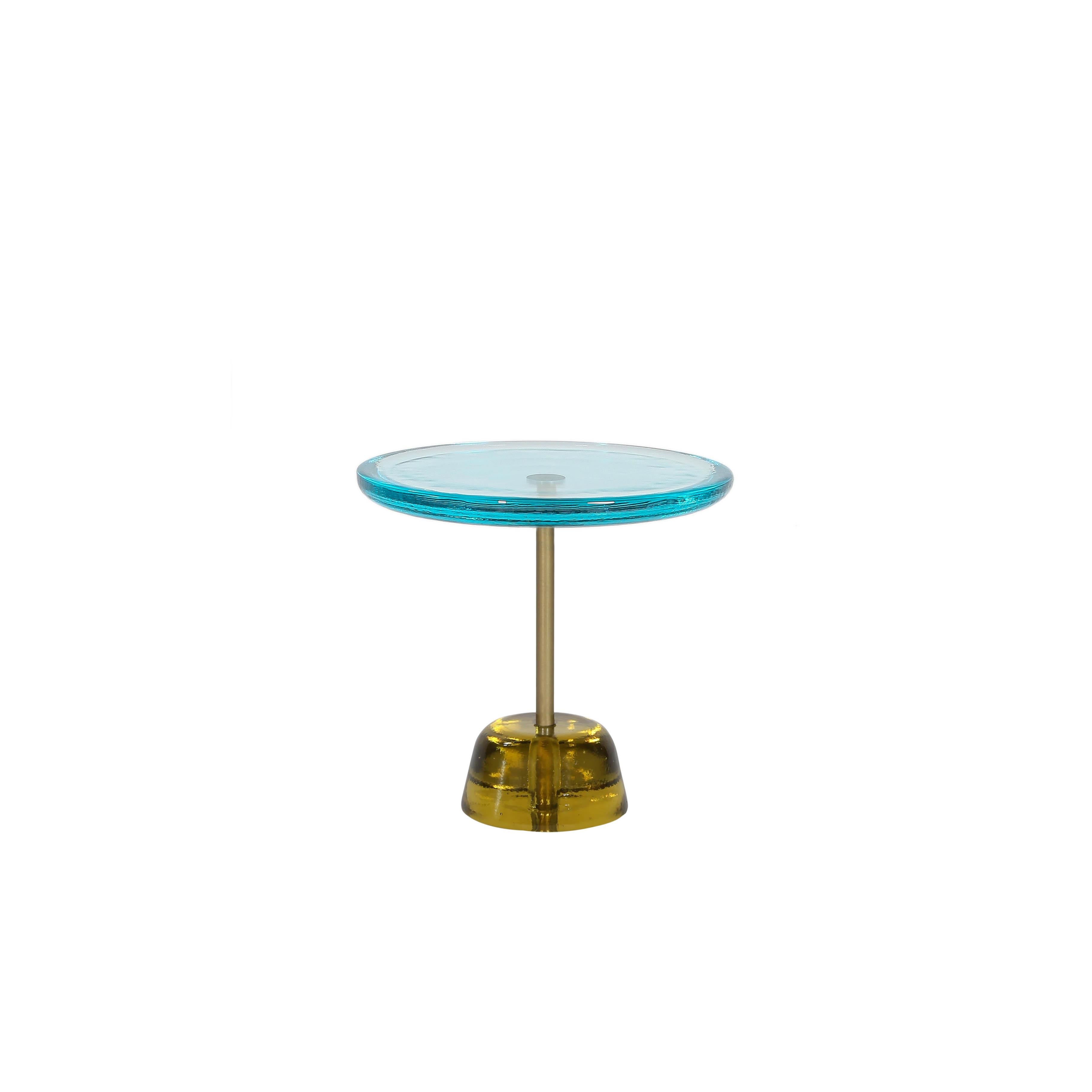 Pina low aqua blue brass side table by Pulpo
Dimensions: D44 x H42 cm
Materials: glass; brass and steel

Also available in different colours.

Sebastian Herkner’s distinctively tall, skinny side table series pina is inspired by the abstract turns