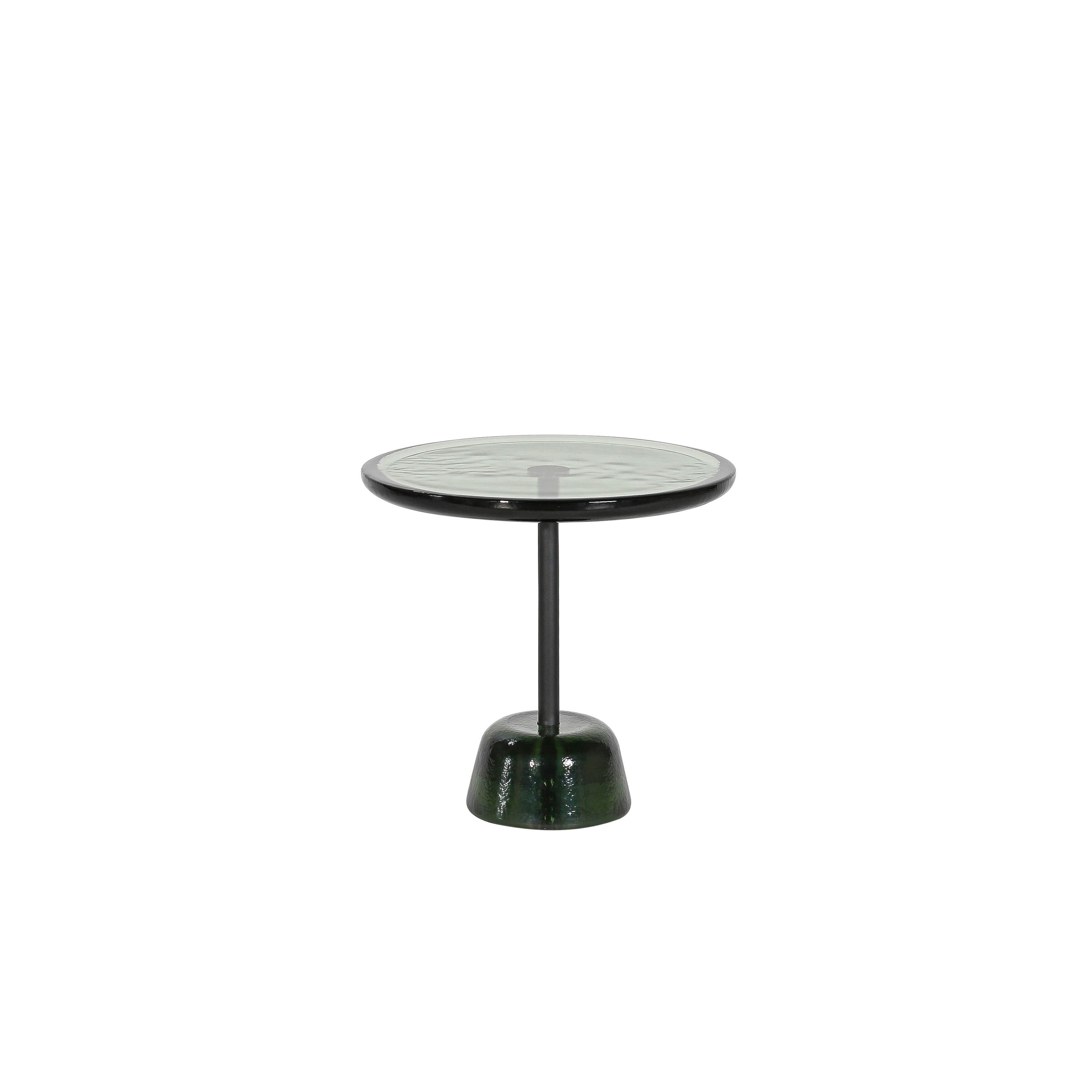 Pina low green black side table by Pulpo
Dimensions: D 44 x H 42 cm
Materials: glass; brass and steel

Also available in different colors.

Sebastian Herkner’s distinctively tall, skinny side table series pina is inspired by the abstract turns