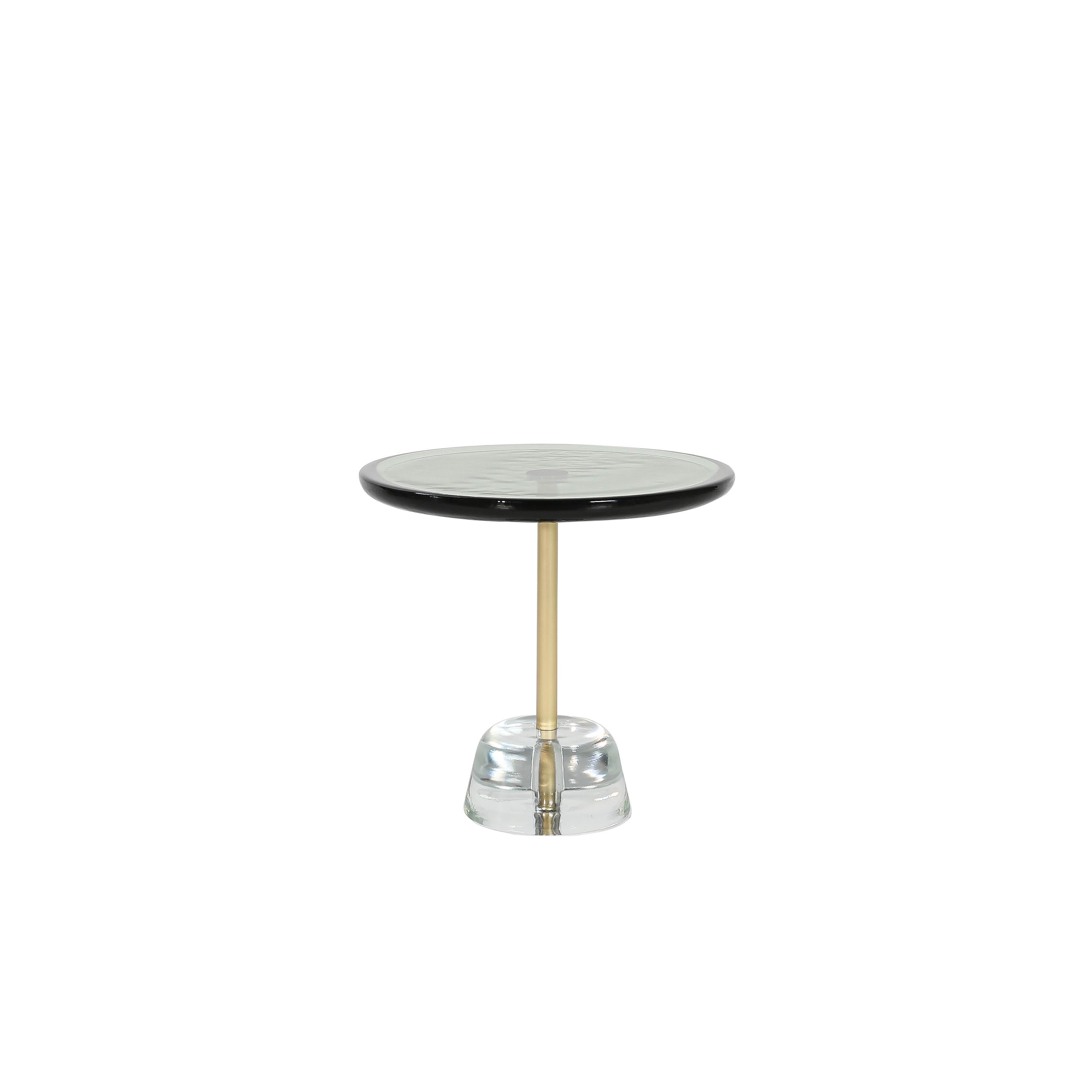 Pina low green brass transparent side Table by Pulpo
Dimensions: D44 x H42 cm
Materials: glass; brass and steel

Also available in different colours. Please contact us.

Sebastian Herkner’s distinctively tall, skinny side table series pina is