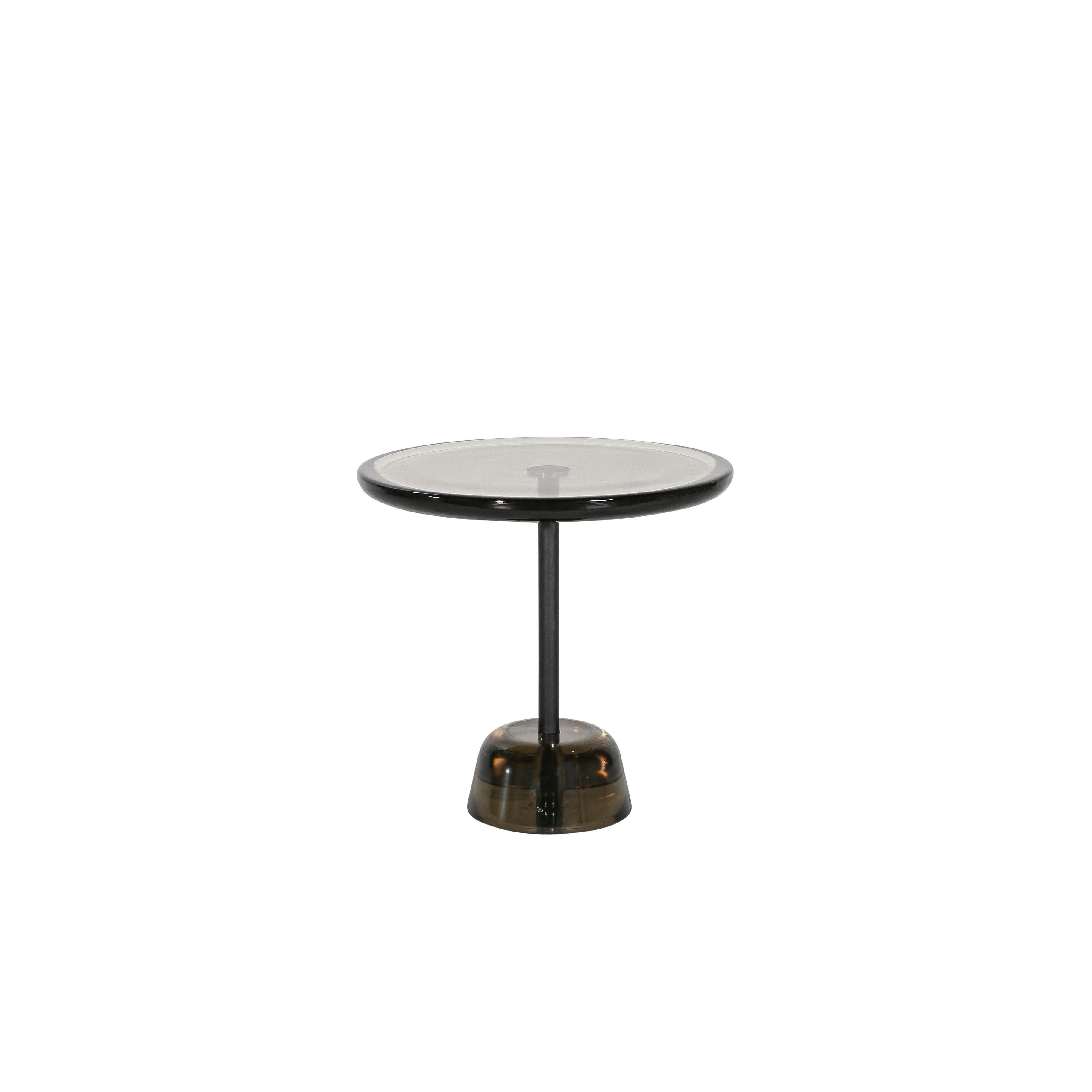 Pina Low Light Grey Black Side Table by Pulpo
Dimensions: D44 x H42 cm
Materials: glass; brass and steel

Also available in different colours. Please contact us.

Sebastian Herkner’s distinctively tall, skinny side table series pina is inspired by