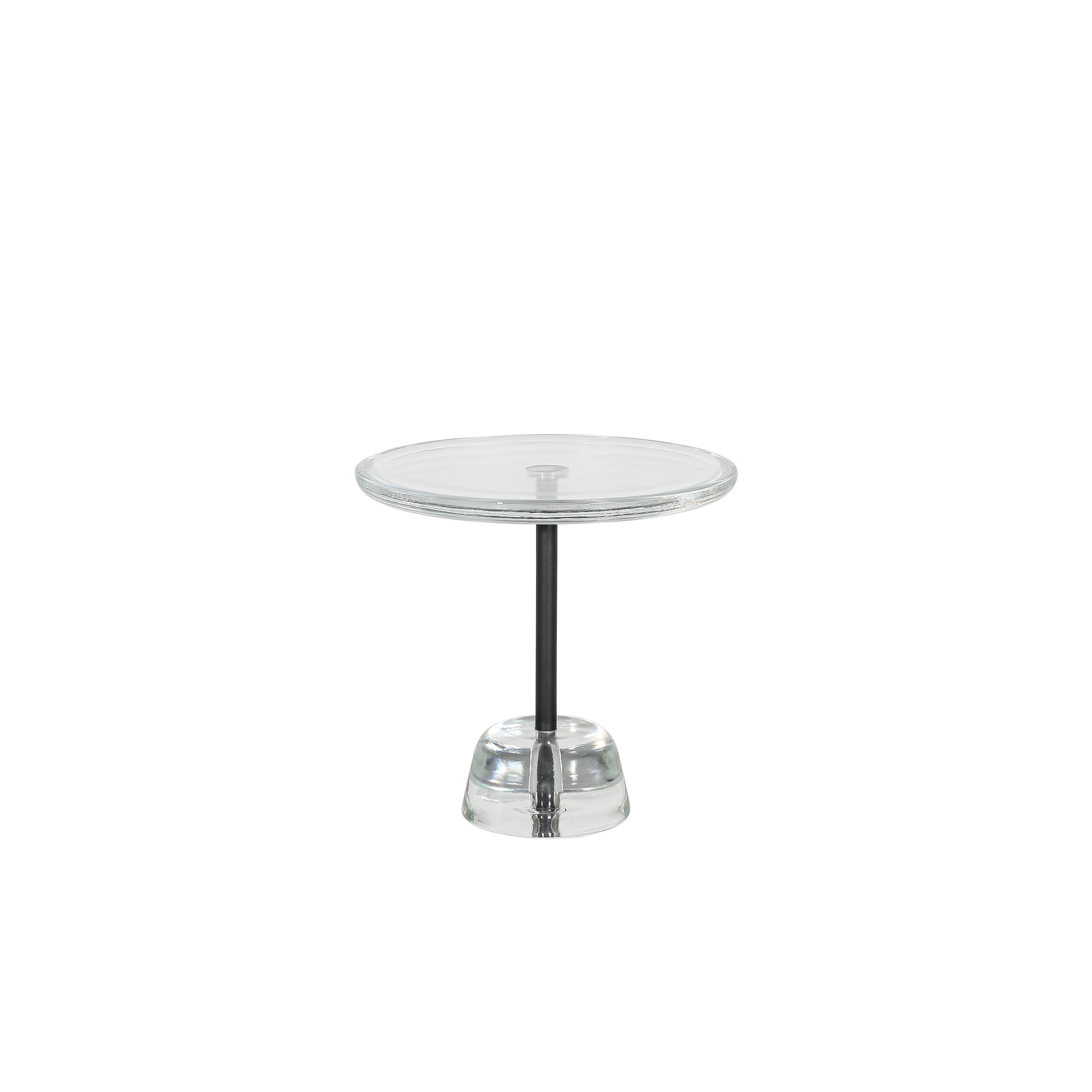 Pina low transparent black side table by Pulpo
Dimensions: D44 x H42 cm
Materials: glass; brass and steel

Also available in different colours. 

Sebastian Herkner’s distinctively tall, skinny side table series pina is inspired by the abstract