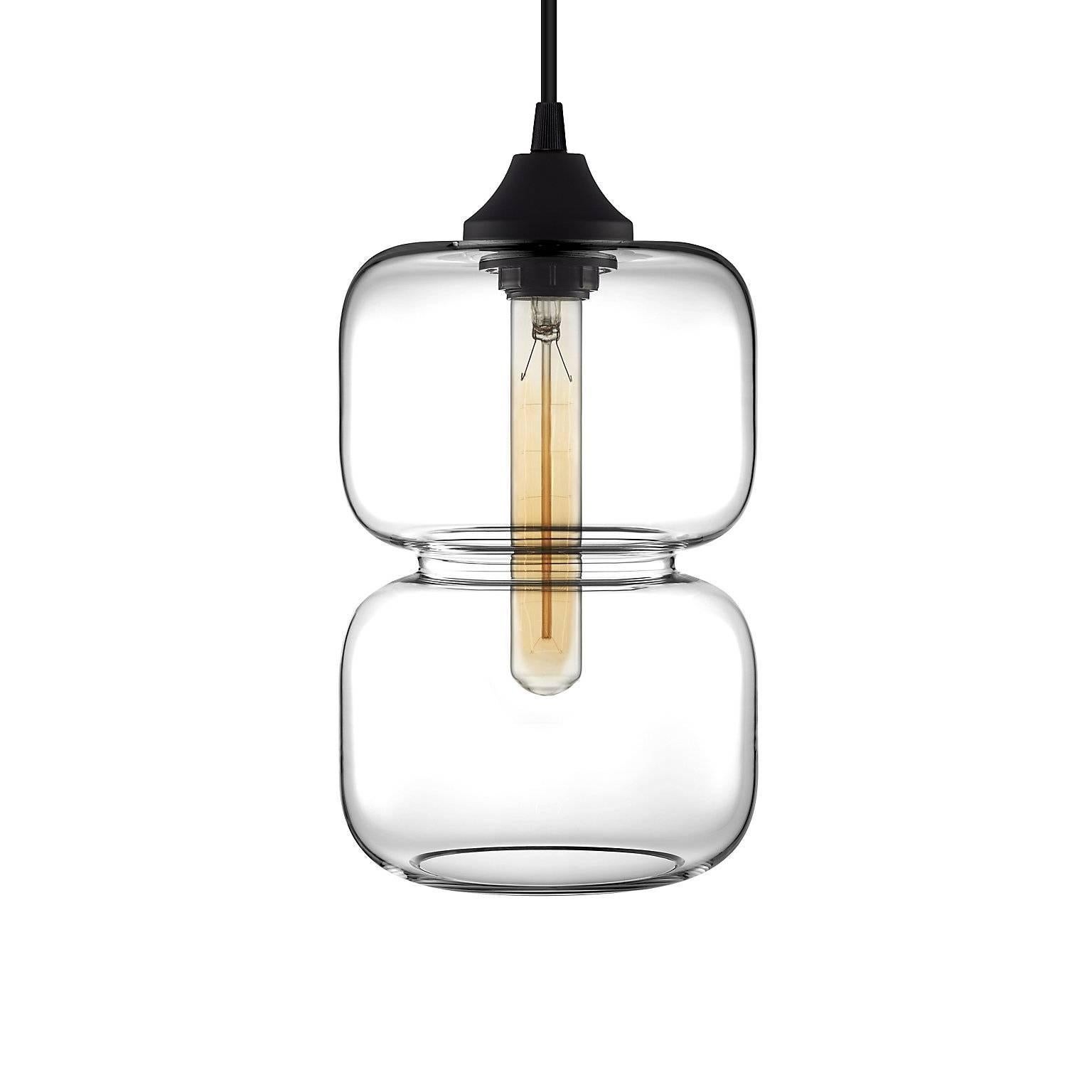 Blending the elements of shapes and hues, the curvaceous Pinch pendant brings playful balance and to any space. Every single glass pendant light that comes from Niche is handblown by real human beings in a state-of-the-art studio located in Beacon,