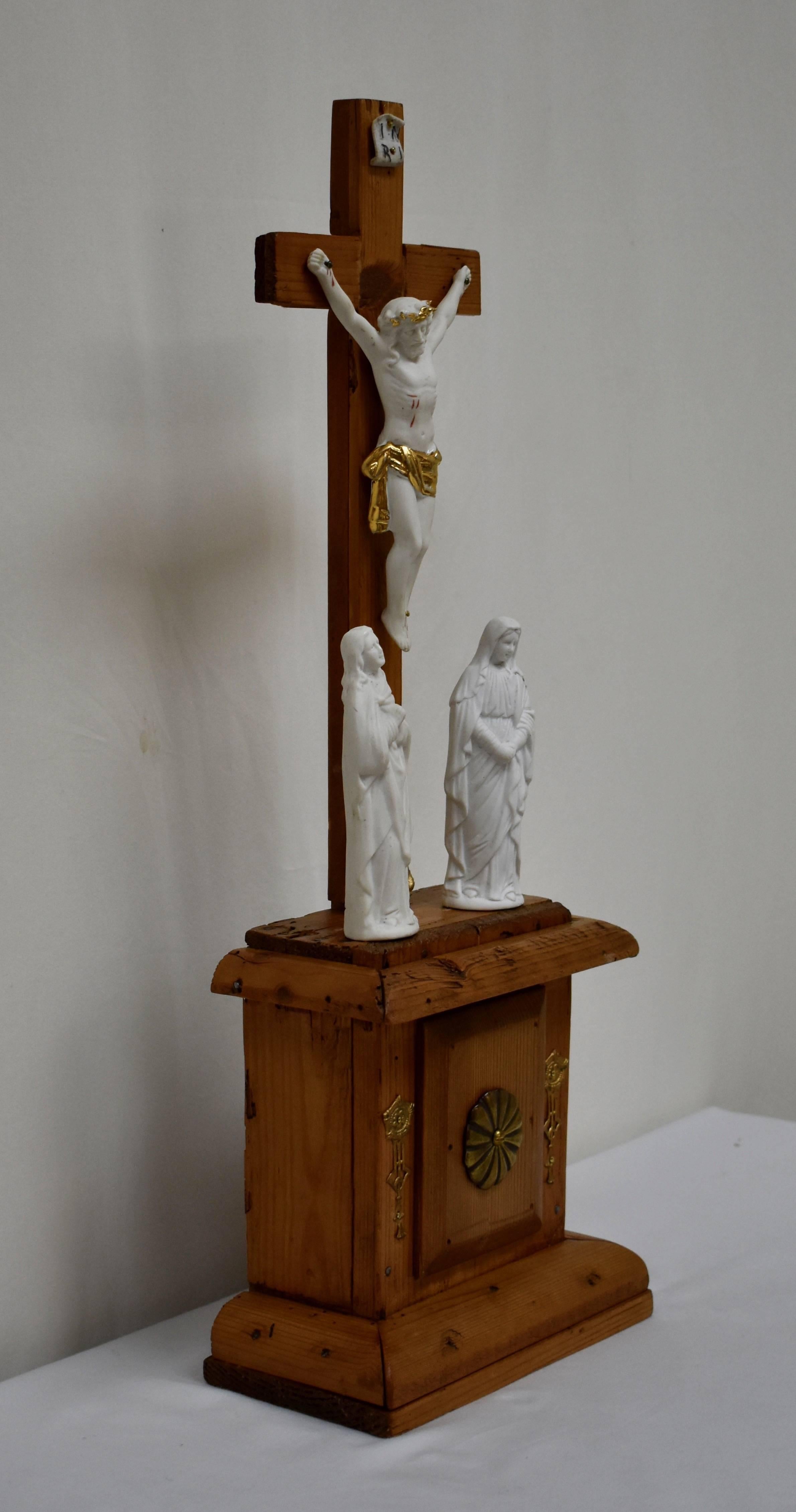 We found this beautiful devotional piece while rooting through the cellar of a gypsy we know in Eger, Hungary. The plinth and cross were covered in old worn and moth-eaten purple velvet which, when removed, revealed the lovely pine beneath, and