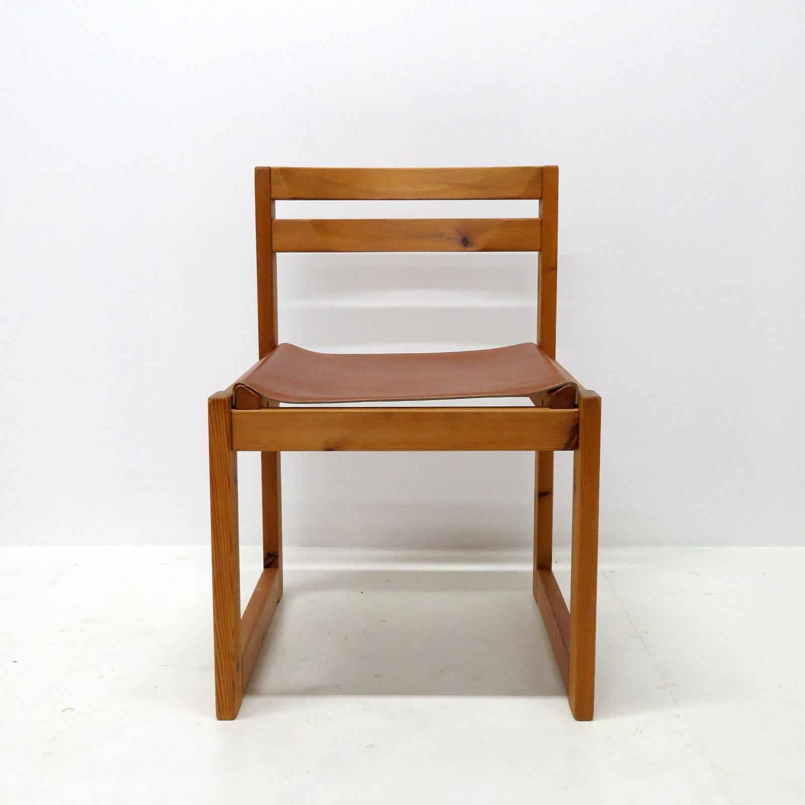 Wonderful set of four dining chairs designed by Knud Færch for Sorø Stolefabrik, 1970, with frames in pine and thick leather seats.