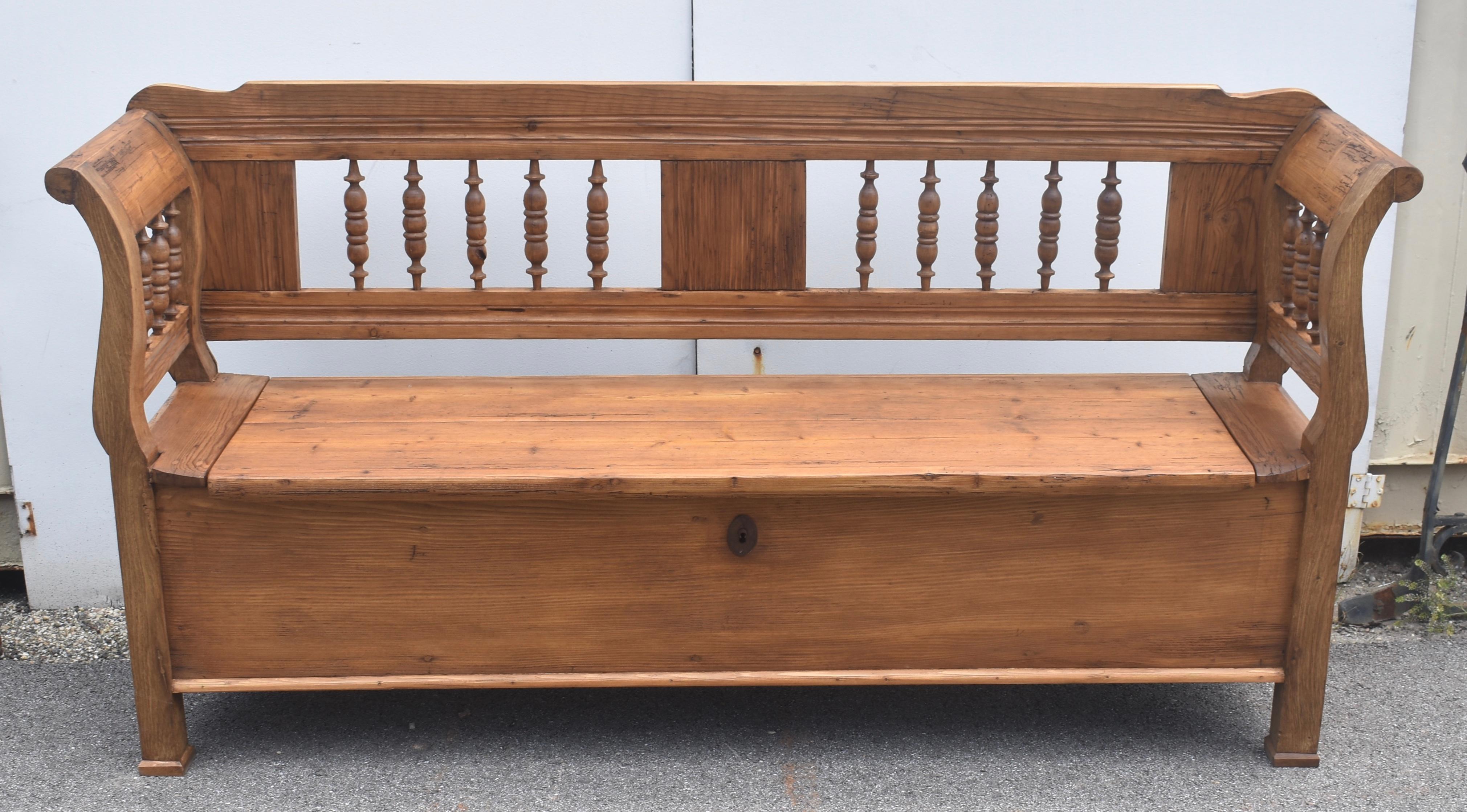 What an outstanding Box Bench! The oak and the pine contrast beautifully to create a deep rich warmth perfect for this piece.  For most of its length the top rail is flat, only following a curve where it meets the scrolled armrest.  The straight