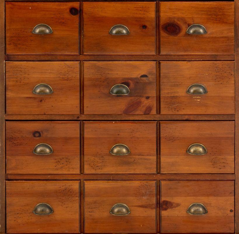 Pine Apothecary Cabinet Style Chest of Drawers, four drawers, each drawer face with three brass pulls. 37.5