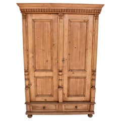 Armoire en pin avec deux portes et un tiroir