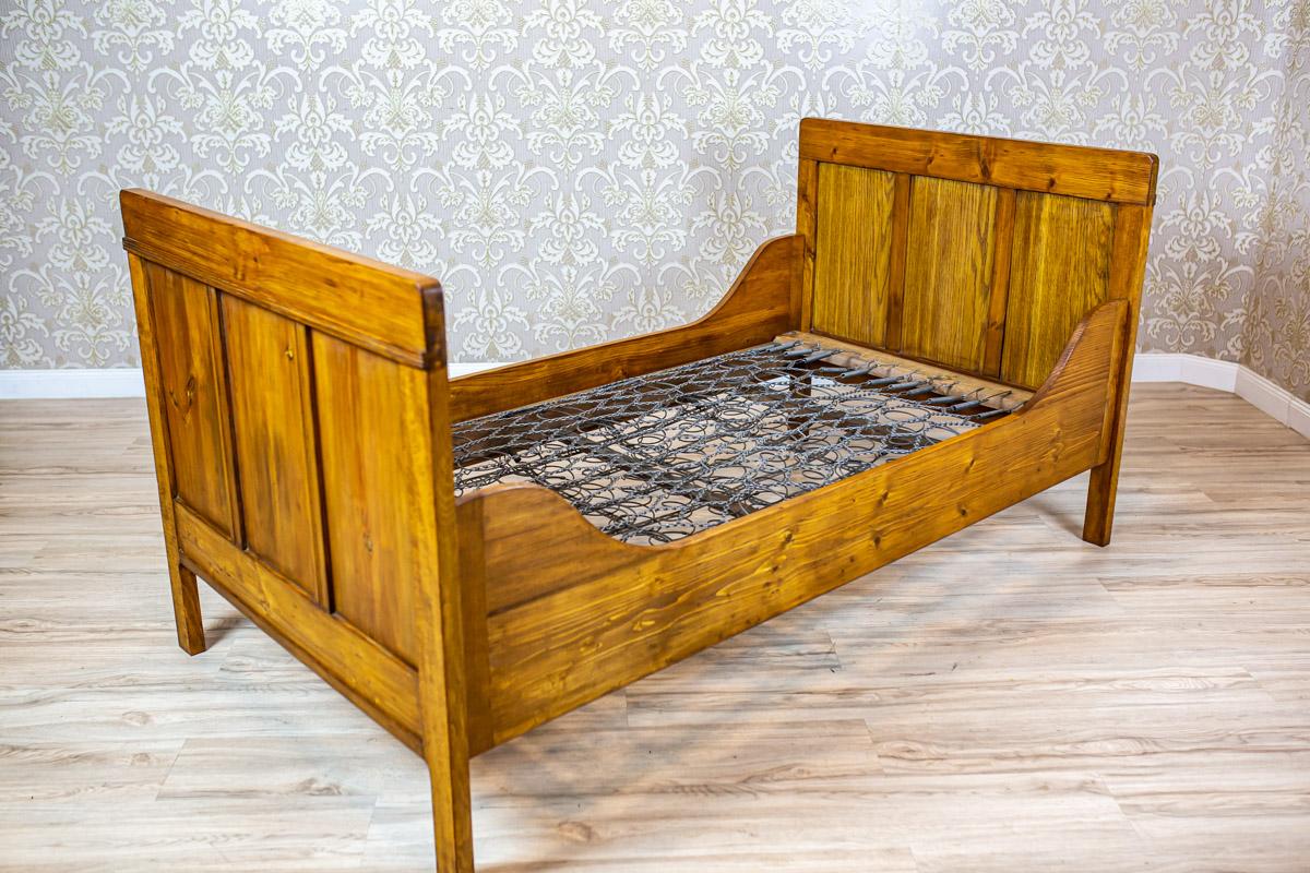 Pine Bed in Art Nouveau Style Circa 1910

A single bed made of pine wood, dating back to approximately 1910. The bed frame features rectangular panels. The center has a removable spring mattress base, which can be replaced if needed.

The furniture