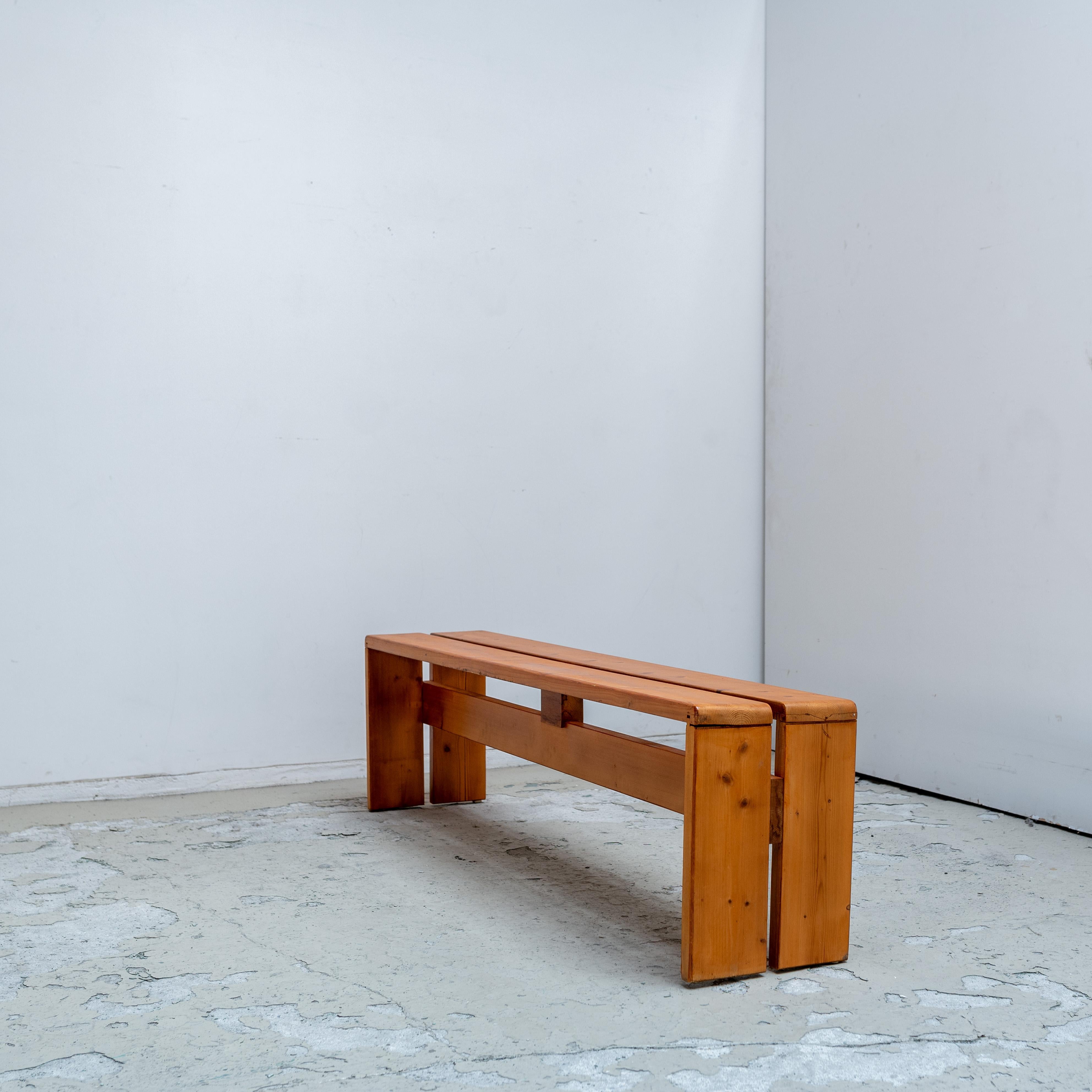 The pine bench, that was designed by Charlotte Perriand for Les Arcs.
 
Les Arcs is the first ski resort built for the general public in the Savoie region of France, created in 1967. The project was led by Charlotte Perriand, with renowned