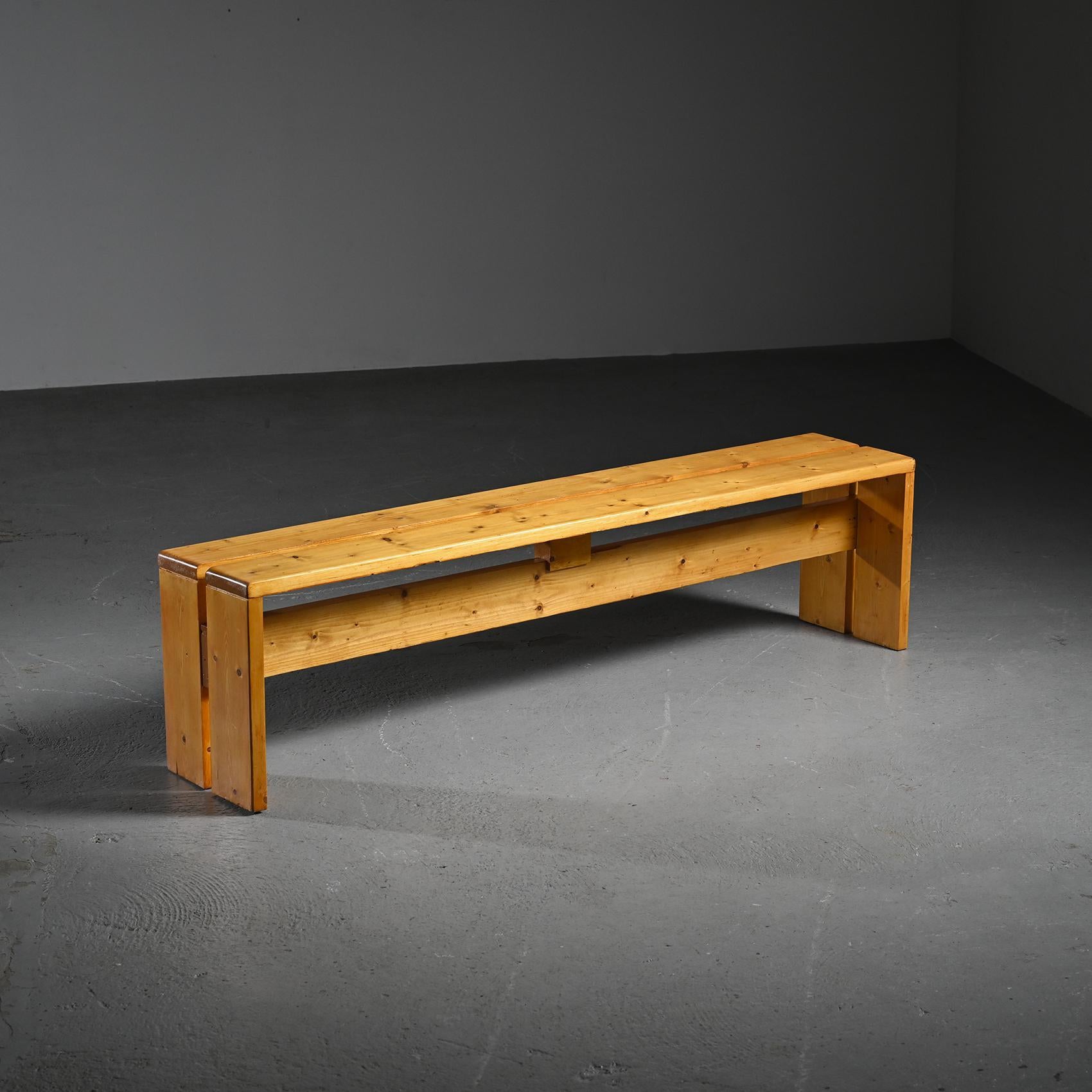 Solid pine bench, model selected for Les Arcs 1800 ski resort, in the French Alps.

Perriand's passion for the mountains and her dedication to creating a perfect skiing experience is evident in the thoughtful design of these stools. Her work at Les
