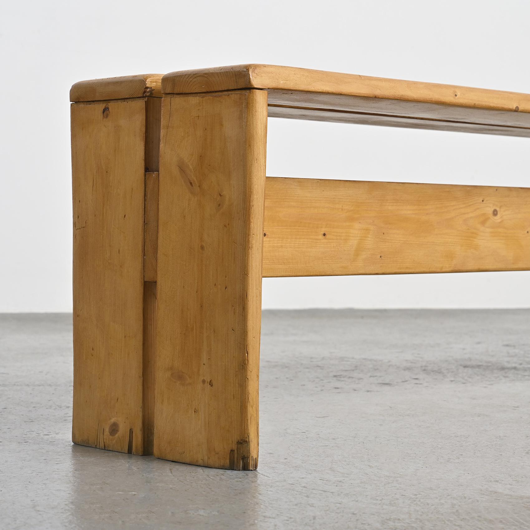 Solid pine bench, model selected for Les Arcs 1800 ski resort, in the French Alps.

Perriand's passion for the mountains and her dedication to creating a perfect skiing experience is evident in the thoughtful design of these stools. Her work at Les