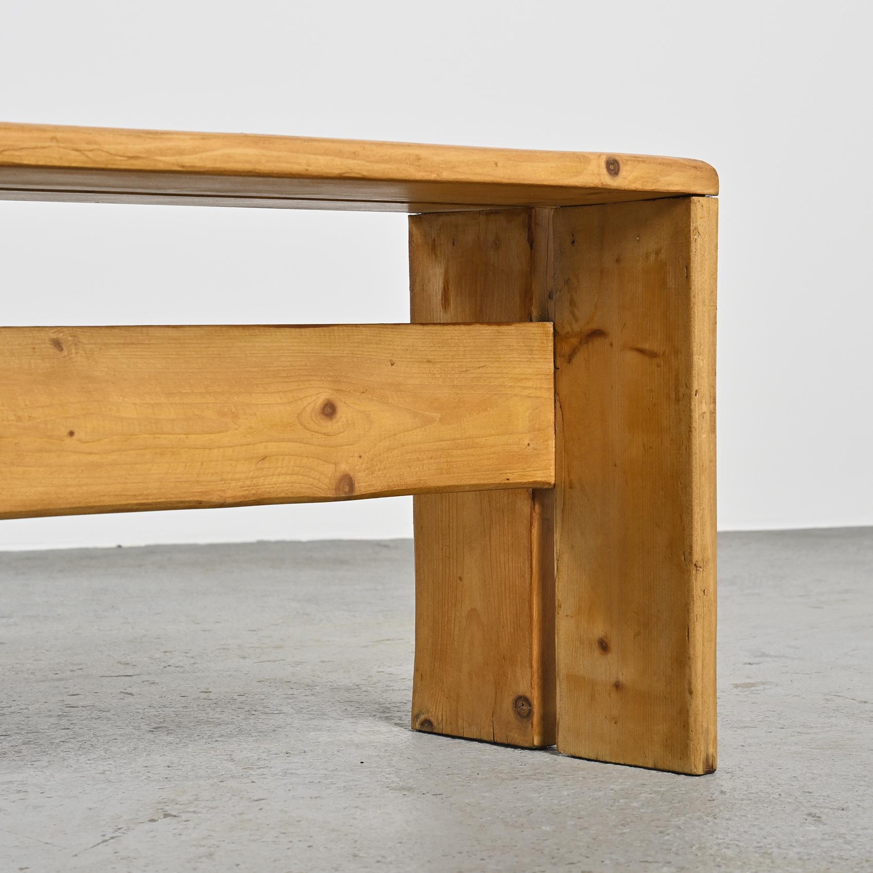 Solid pine bench, model selected for Les Arcs 1800 ski resort, in the French Alps.

Perriand's passion for the mountains and her dedication to creating a perfect skiing experience is evident in the thoughtful design of these stools. Her work at Les