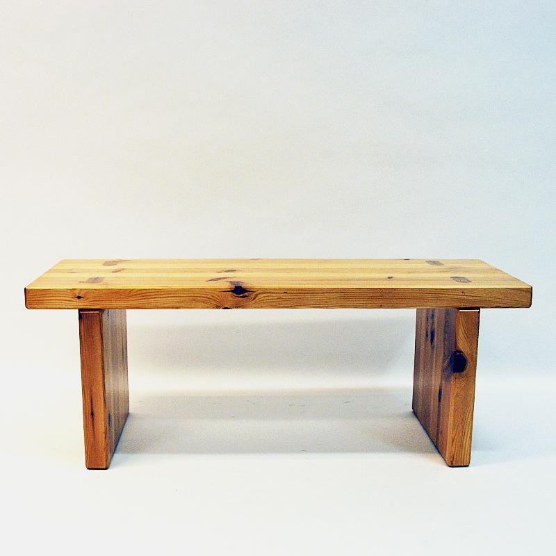 Stabile and rough pine bench or table in the style of Roland Wilhelmsson, Sweden 1970s. The pine benches was a very common furniture of Scandinavian homes in the 1970s being used as a sofabench, television bench or a sitting bench around the