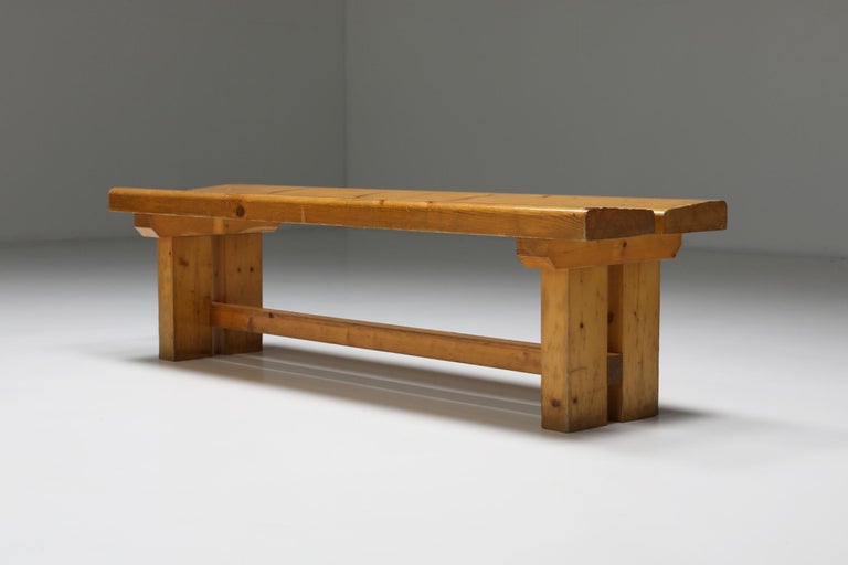 Pine Bench Les Arc by Charlotte Perriand, French Modernism, 1970s

Pine bench designed by the French designer Charlotte Perriand in the 1970s. It is composed of four feet connected by a spacer and two thick slats forming the seat, all made in