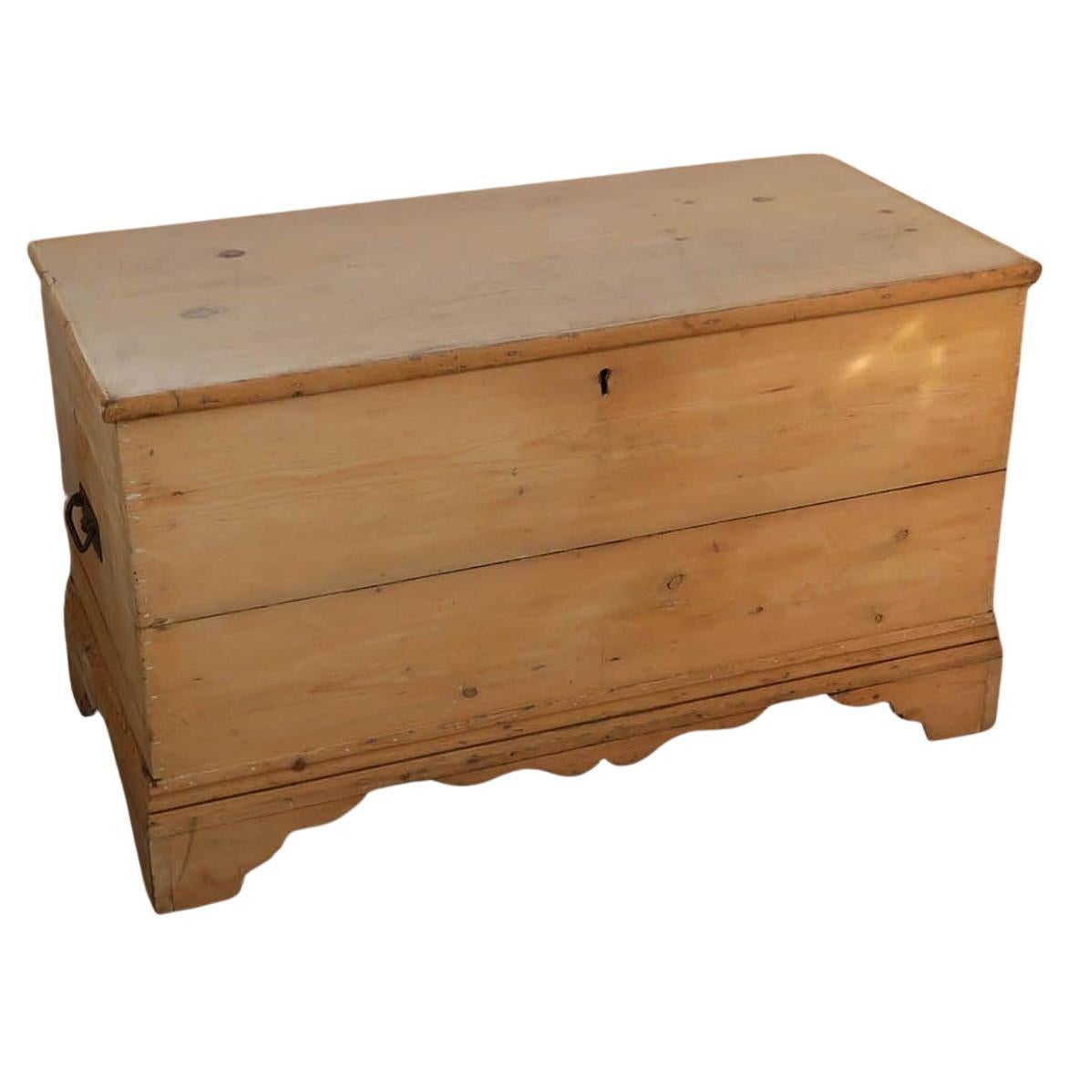Delightful pine chest.

Makes a great coffee table

Wonderful simplicity and great colors.

I particularly like the original bracket feet.

Original paint to the interior

Replaced hinges. Original handles

The lock is missing. 

Restoration to both