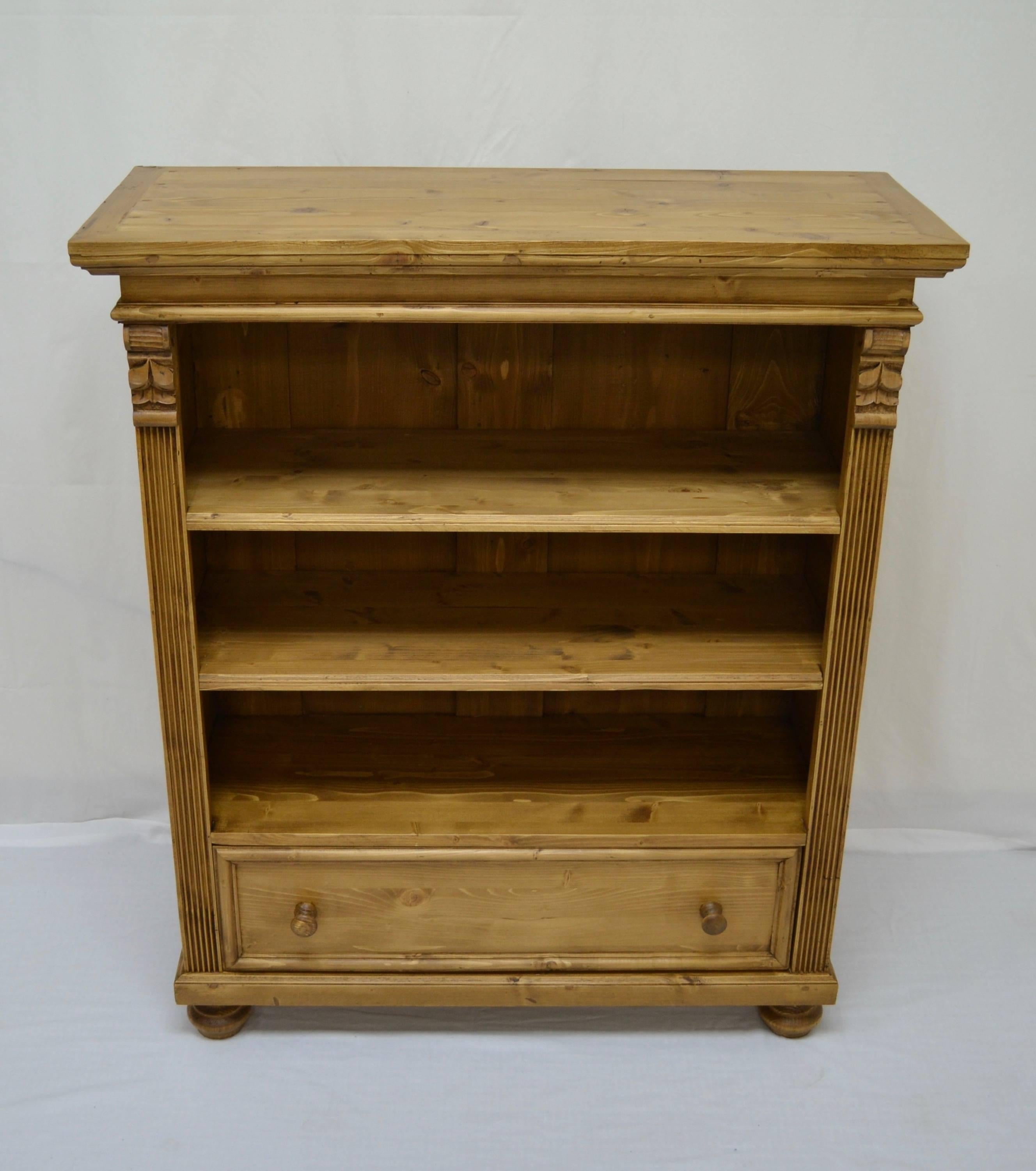 Antique pine bookcases can be hard to find and so can well-made reproductions. Using design features and methods of construction taken from our antique pine furniture, our workshop in Europe takes lightly-used reclaimed pine and fashions our
