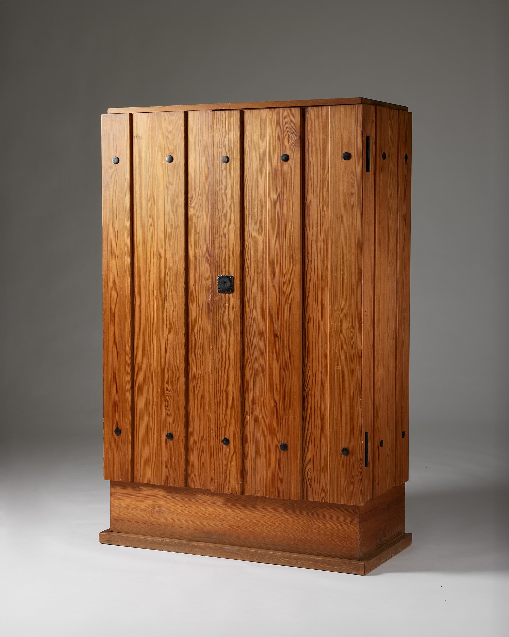 Cabinet ‘Lovö’ designed by Axel Einar Hjorth for Nordiska Kompaniet,
Sweden, 1930s.

Pine and forged iron.

From 1927 to 1938, Axel-Einar Hjorth was the chief architect and designer at the department store Nordiska Kompaniet in Stockholm—which was