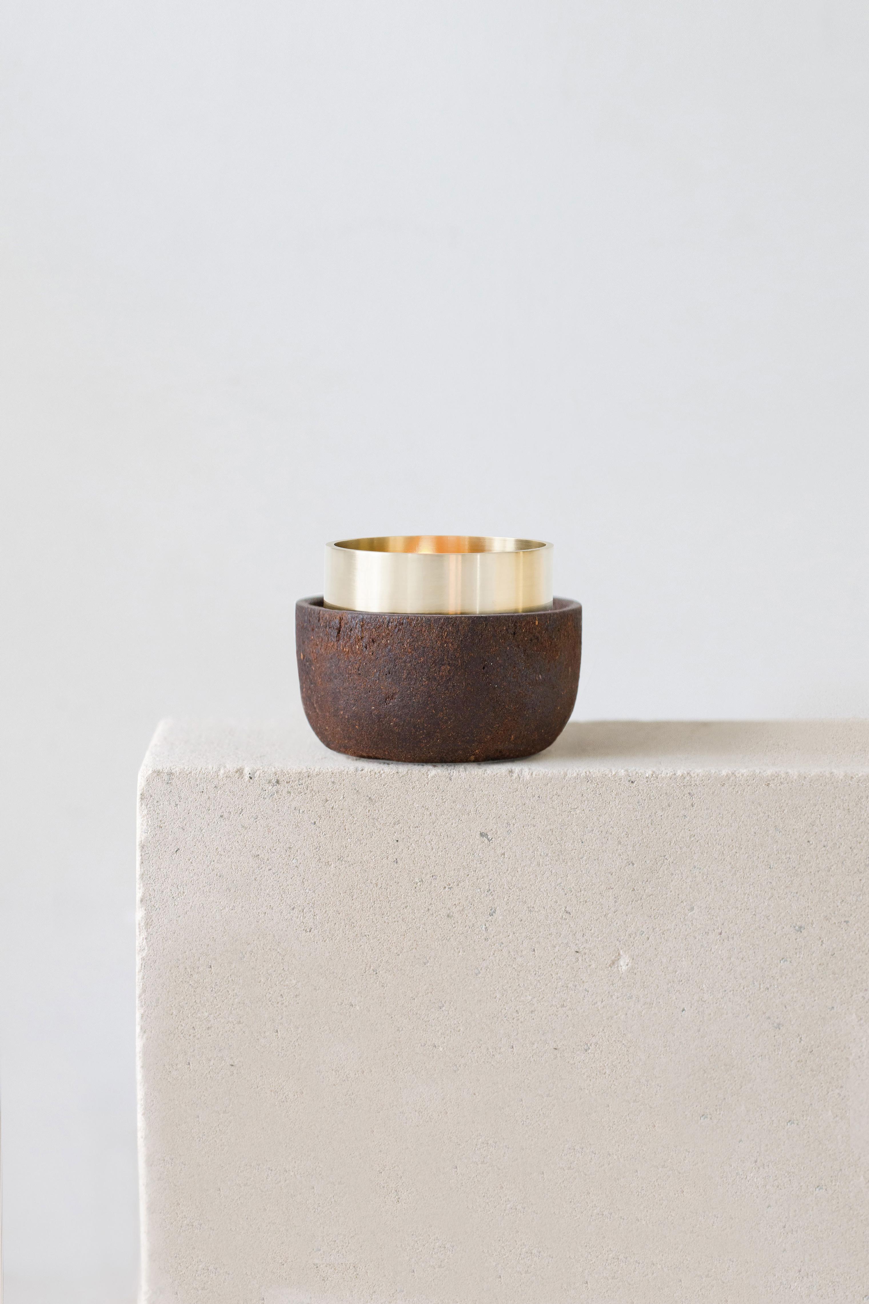 Pine candle holder by Evelina Kudabaite Studio
Handmade
Materials: pine, brass
Dimensions: H 55 mm x D 65 mm
Colour: reddish
Notes: for dry use

Since 2015, product designer Evelina Kudabaite keeps on developing and making GIRIA objects.