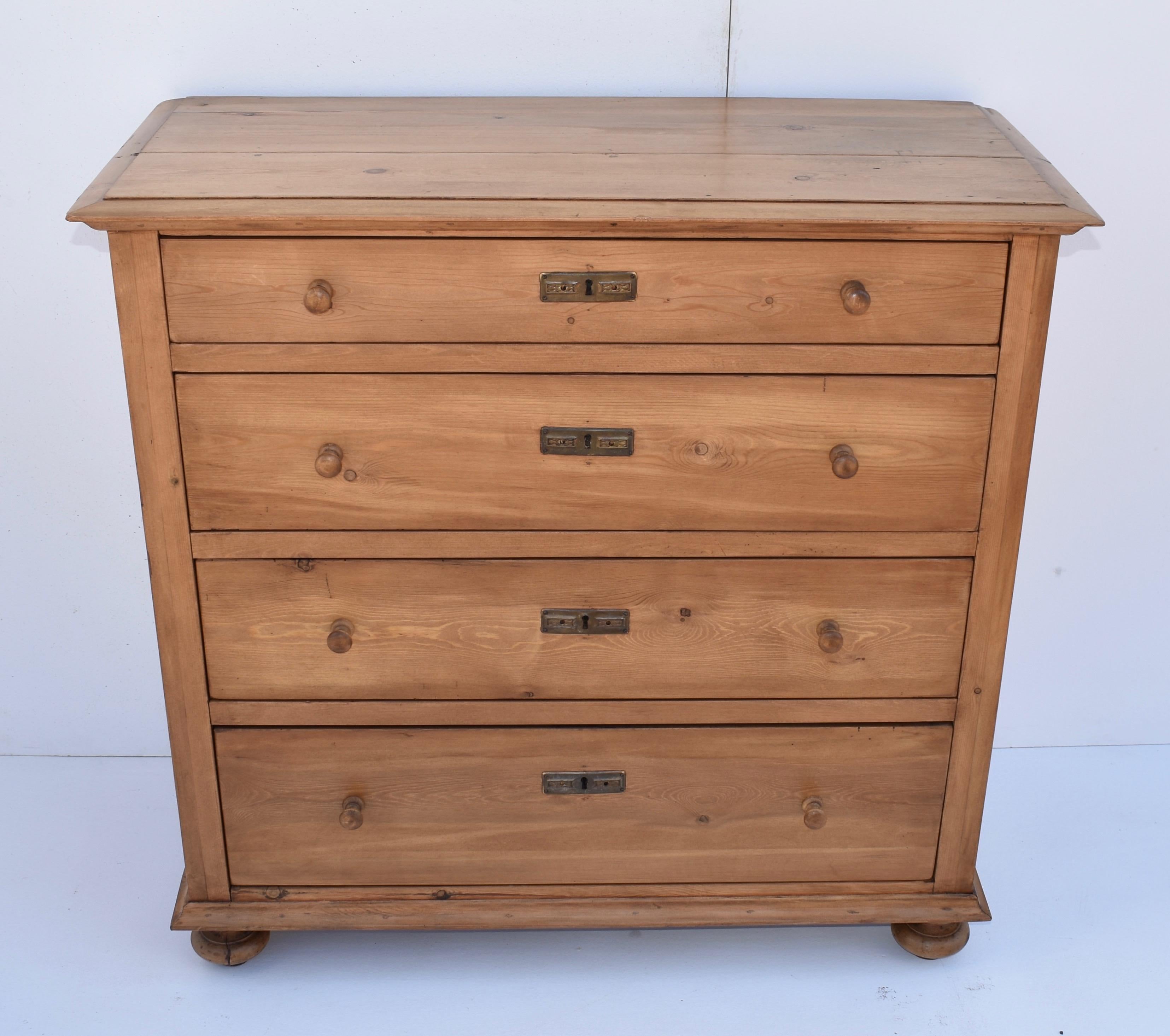 This is a plain chest of four hand-cut dovetailed drawers, its straight lines almost shaker-like in their simplicity. An excellent piece for anywhere shallow profile storage is needed.