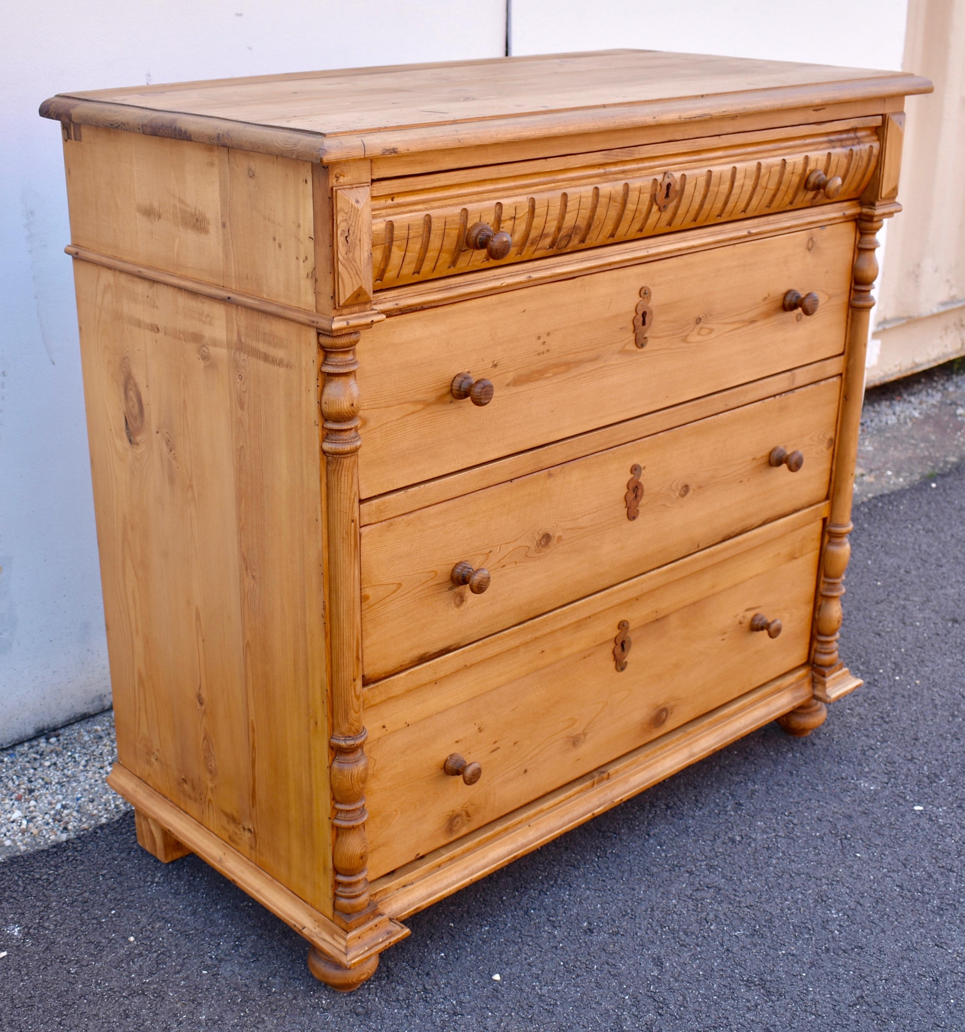 This beautifully compact chest of drawers offers attractive and well-made storage for any bedroom where a small footprint is necessary.  The top drawer, more shallow and decorative than the other three, has a slightly convex front which  bears