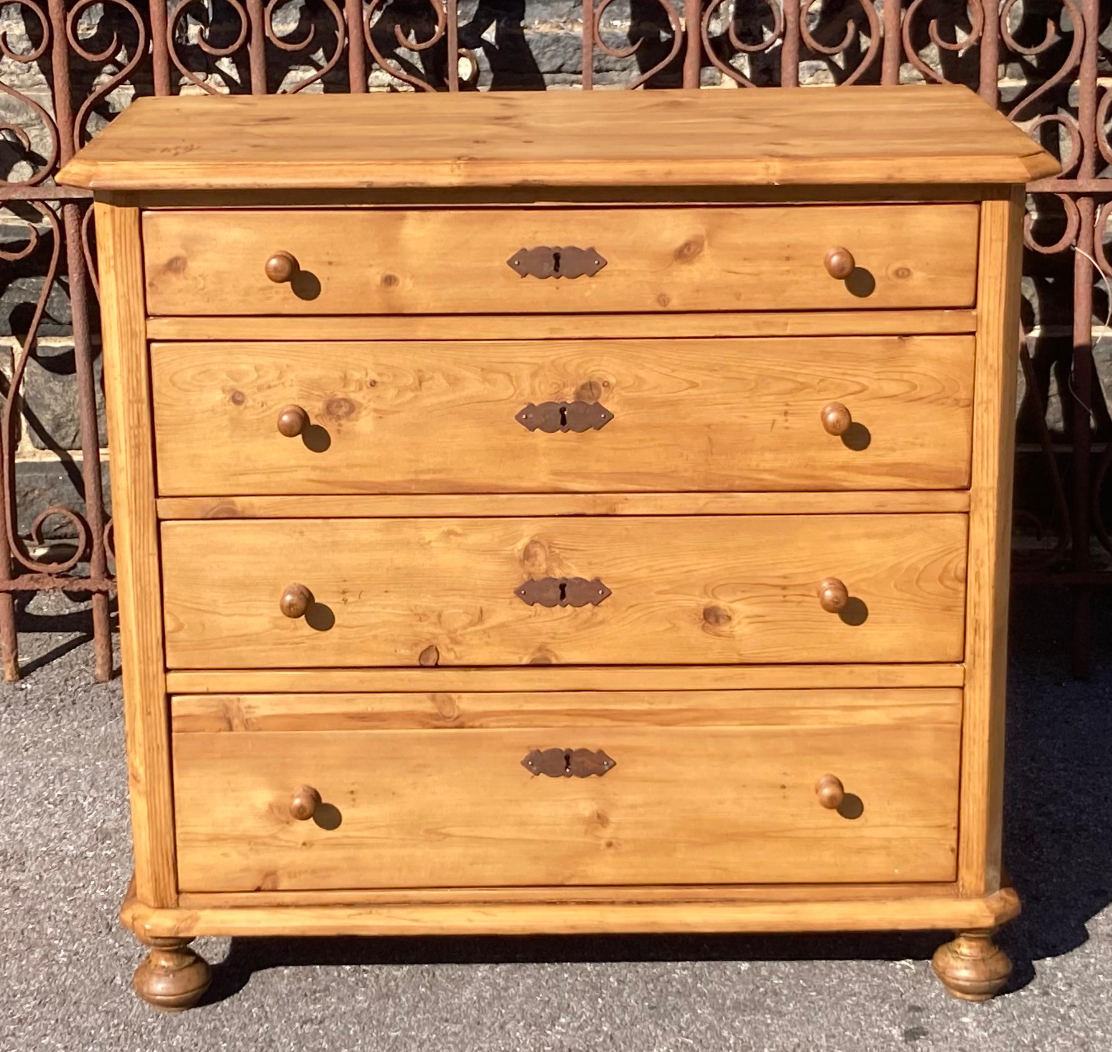  What a gorgeous chest of drawers!   A step-down routed edge and nicely chamfered front corners characterize the top of this small chest of four hand-cut dovetailed drawers.  The chamfer is repeated on the front of the case, which is otherwise plain