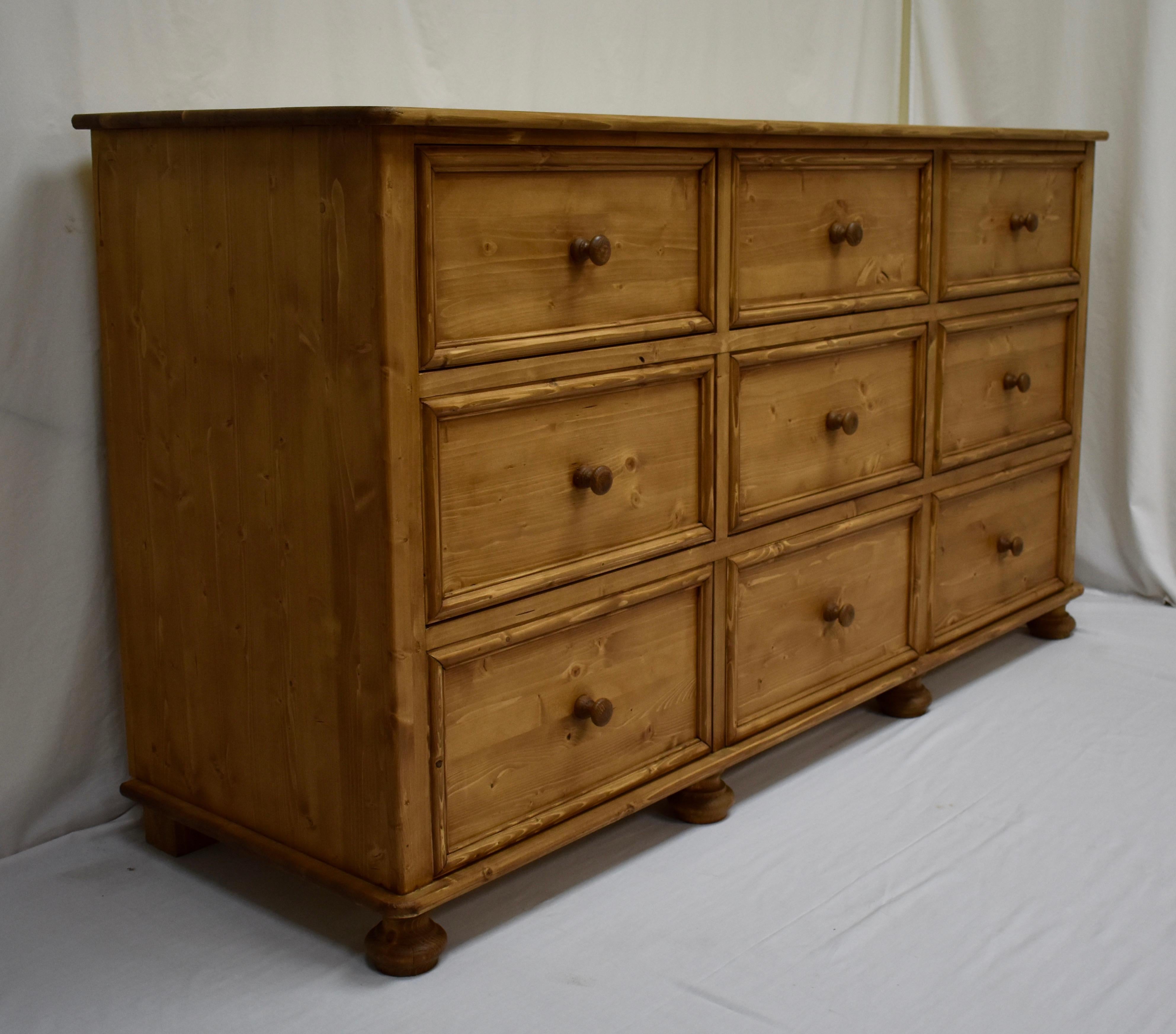 Polished Pine Chest of Nine Drawers