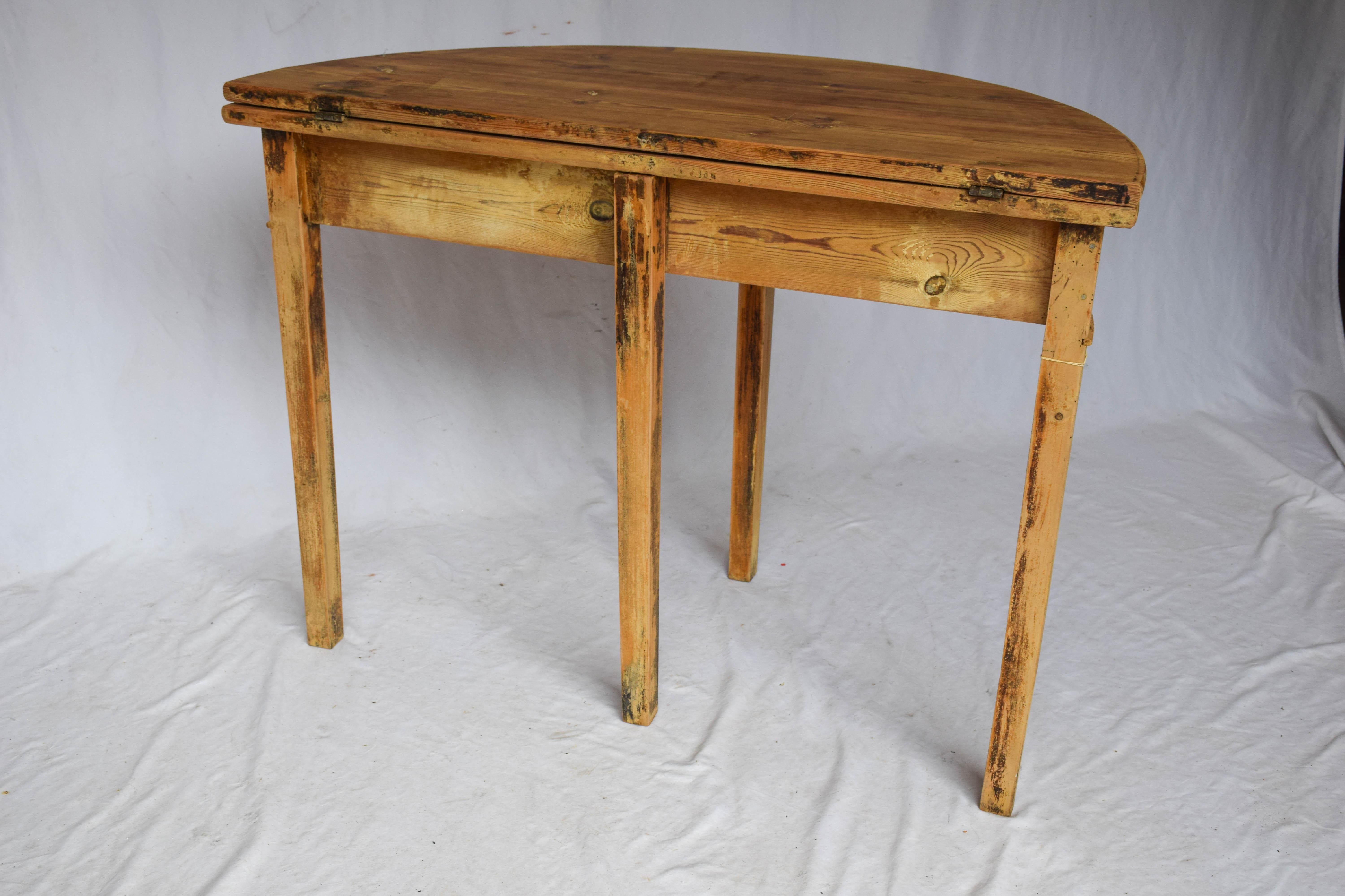 Demilune dropleaf table from France 1800s. Perfect for any niche in your home. 

Measures: 23