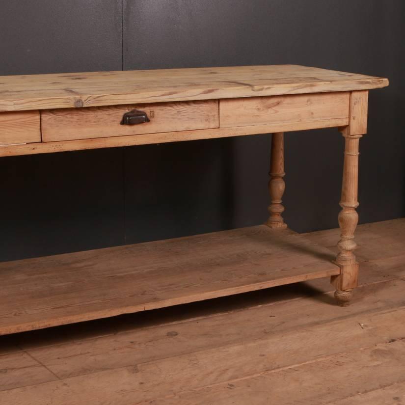 Large 19th century French pale pine drapers table, 1880

 

Dimensions
134 inches (340 cms) wide
25 inches (64 cms) deep
32.5 inches (83 cms) high.