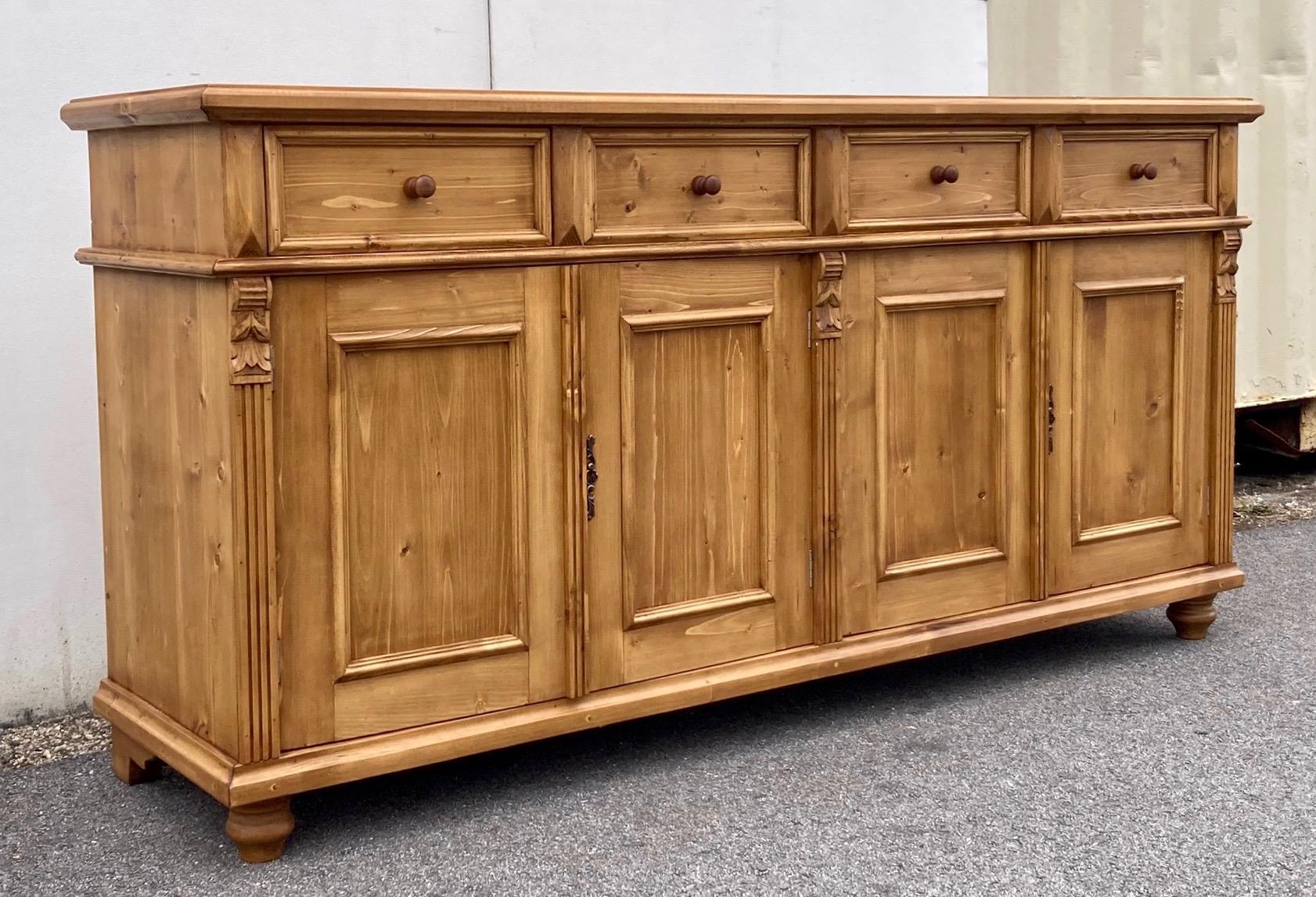 Antique pine sideboards can be hard to find so our workshop in Europe takes good quality European yellow pine to build this piece using traditional design features and construction techniques.  In this case the sideboard base is hand-polished with