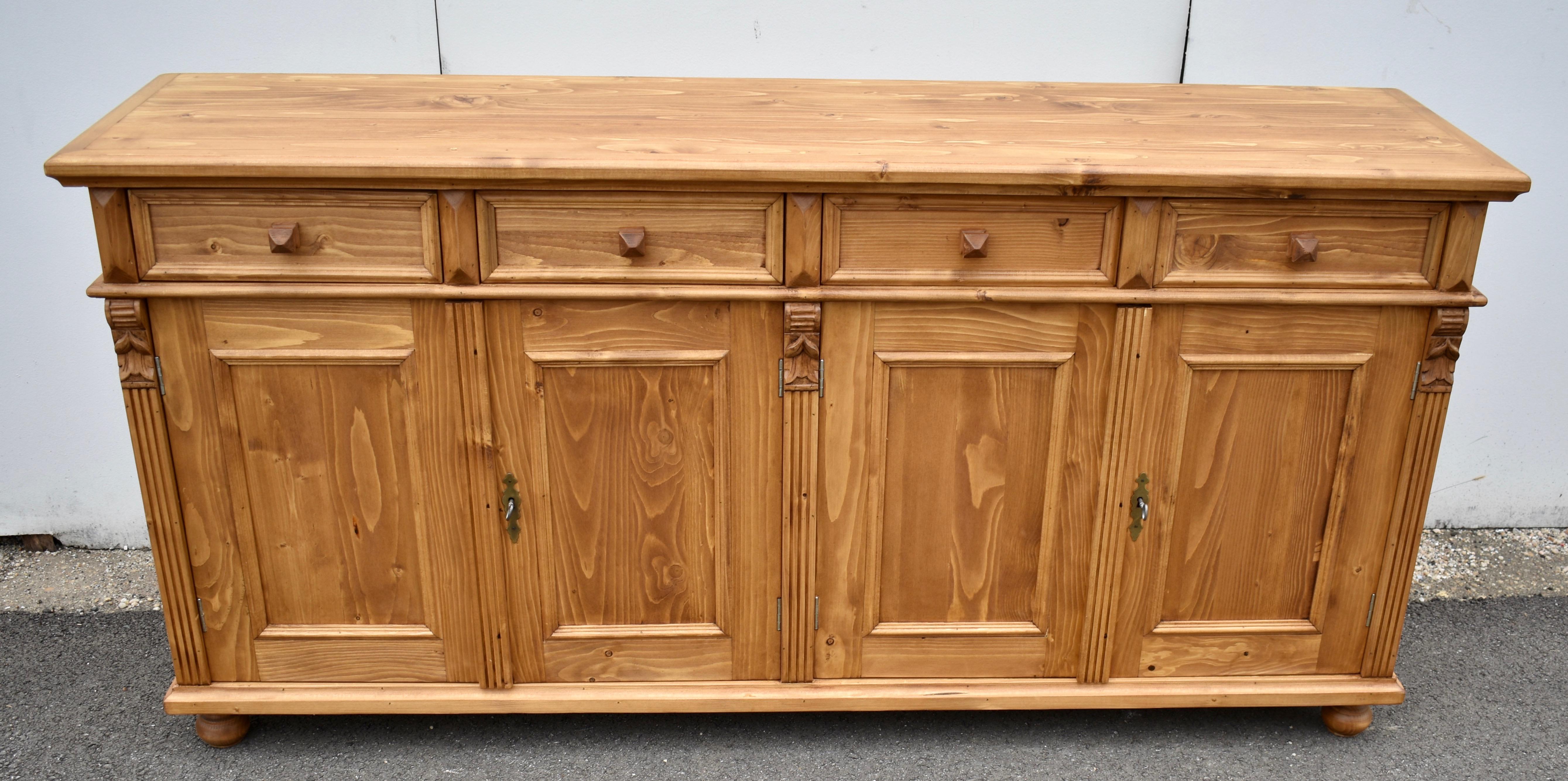 Antique pine sideboards can be hard to find so our workshop in Europe takes good quality European yellow pine to build this piece using traditional design features and construction techniques.  In this case the sideboard base is hand-polished with