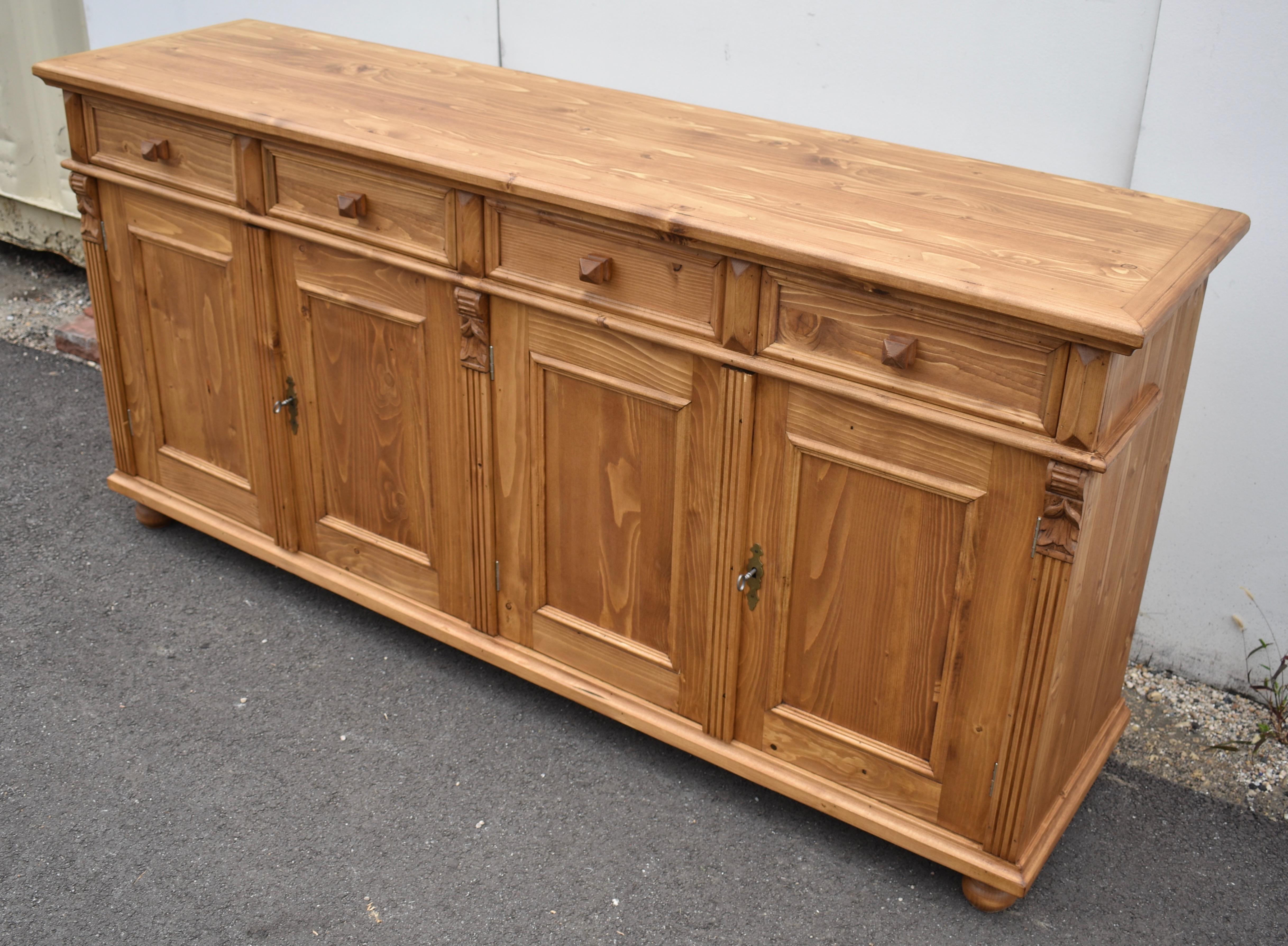 Polished Pine Four Door Sideboard, Reproduction.