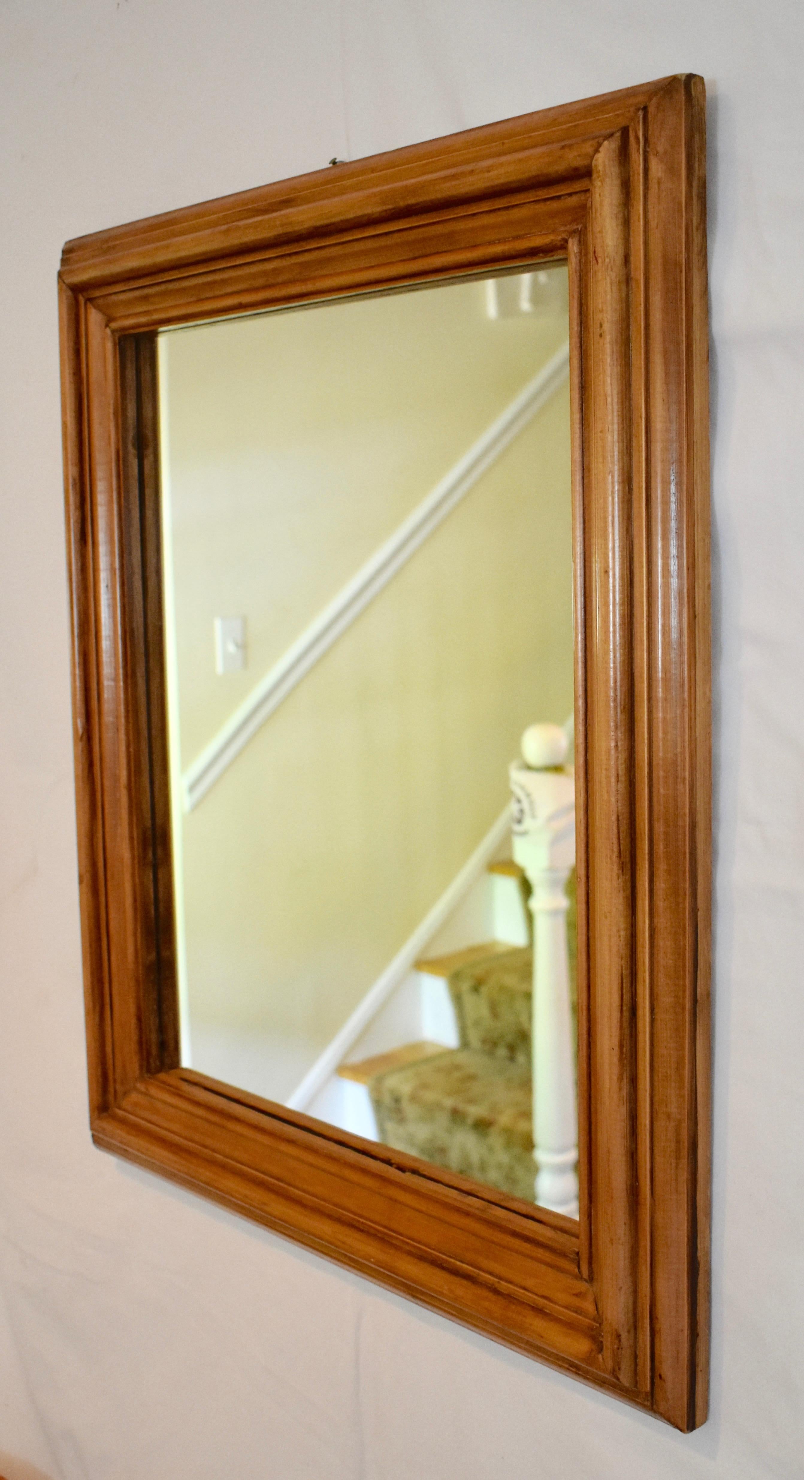This attractive wall mirror has a nicely-contoured bull-nosed polished pine frame made from reclaimed material. Frame molding is 3