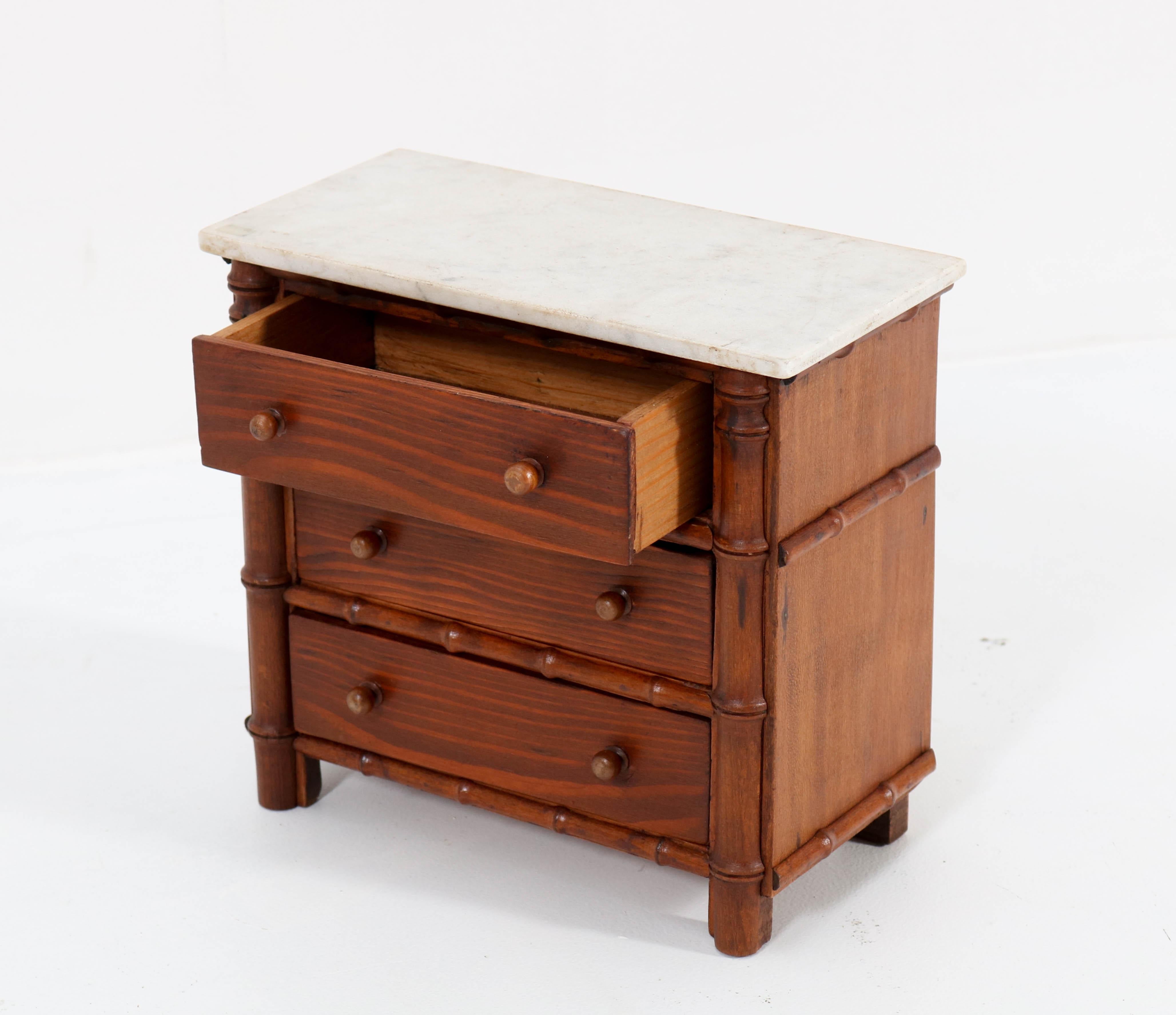 Early 20th Century Pine French Faux Bamboo Miniature Chest of Drawers with Marble Top, 1920s For Sale