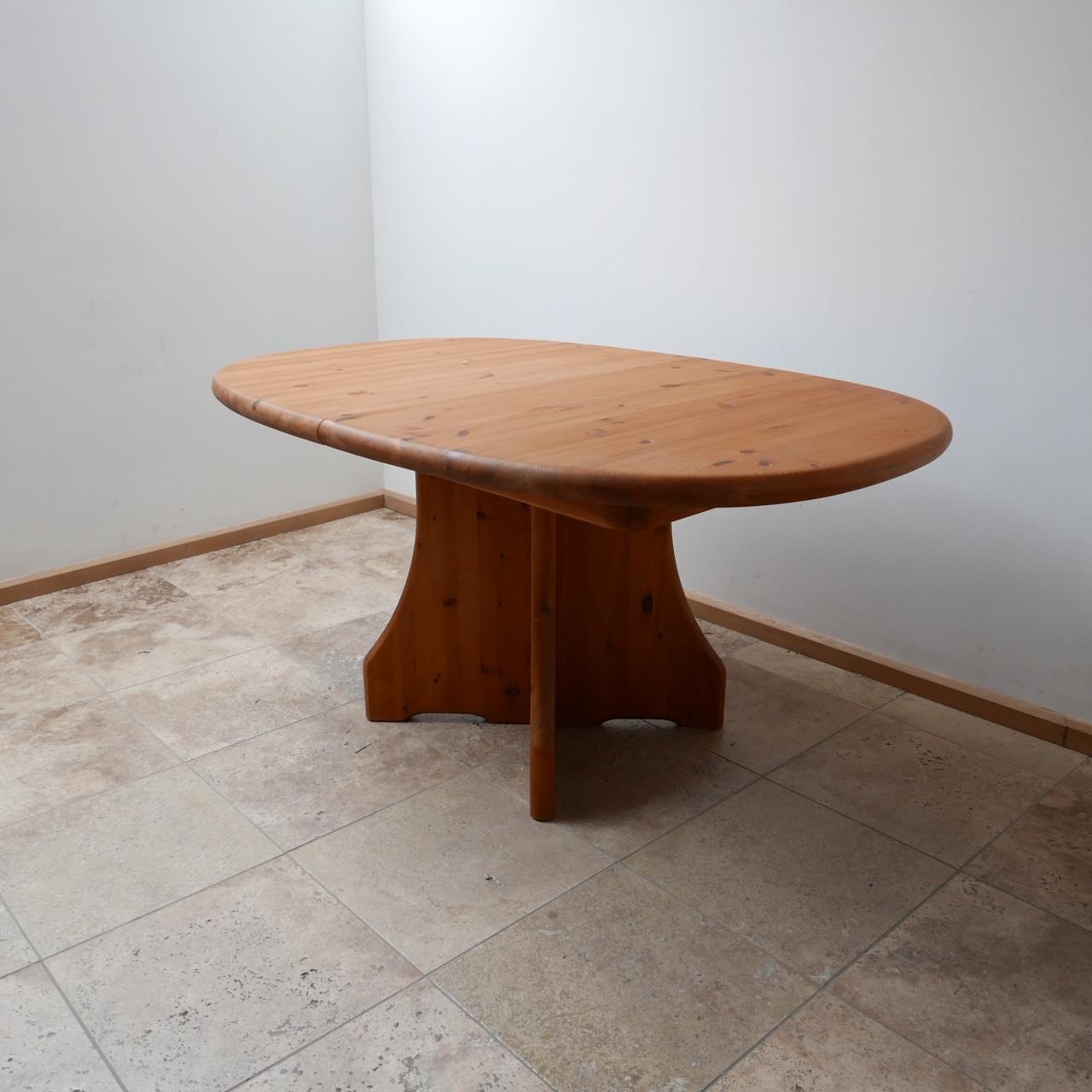 A large pine dining table. 

Midcentury, Belgium, c1970s. 

Solid pine, in good condition, there is one small mark to the top (see photos) but generally very good condition. 

Originally would have been an extender but the leaves are lacking.